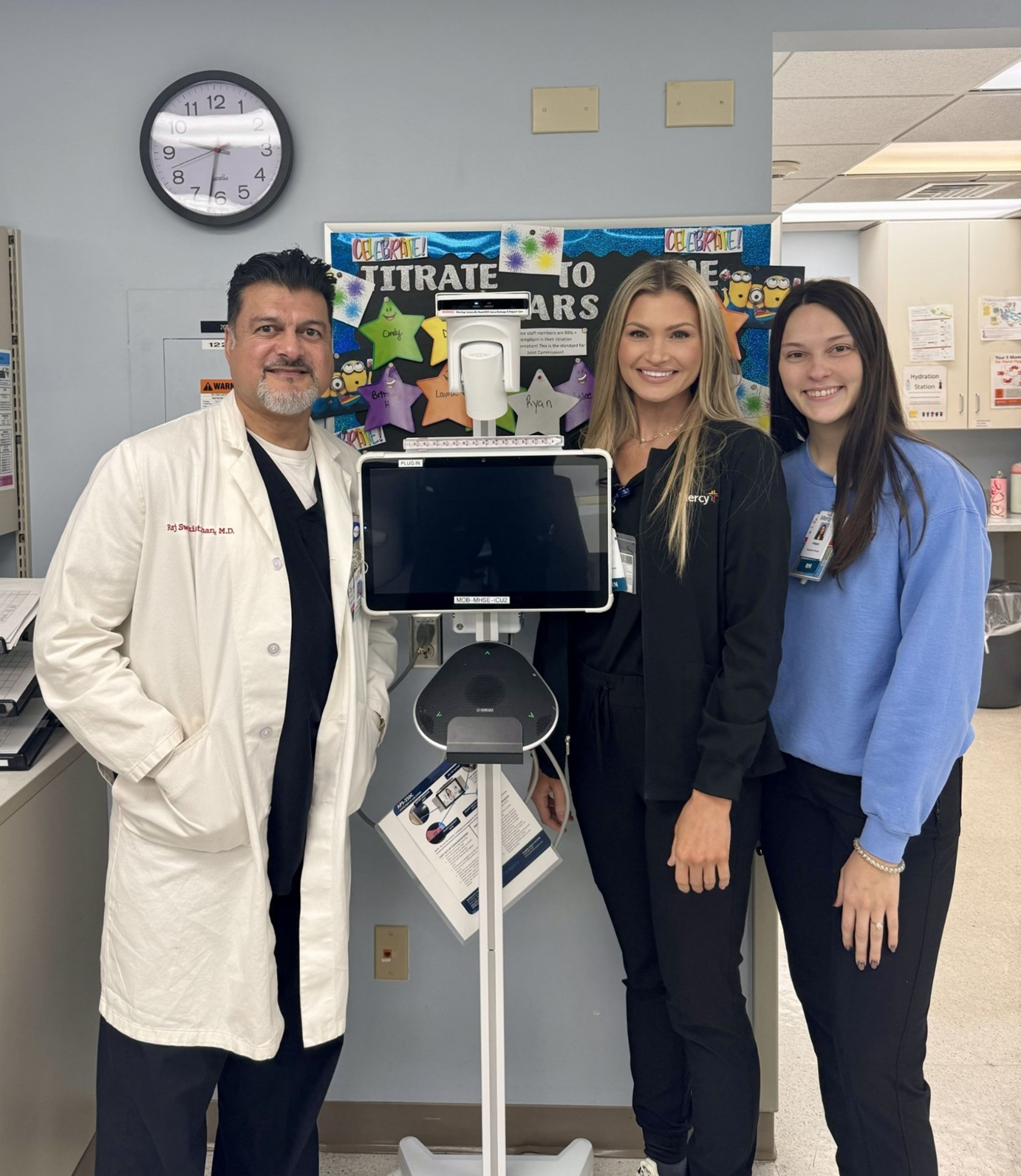 
Mercy Southeast's Dr. Rajesh Swaminathan and caregivers Tori Williams, center, and Abi Hoch, right, show off a piece of new mobile vICU equipment.
