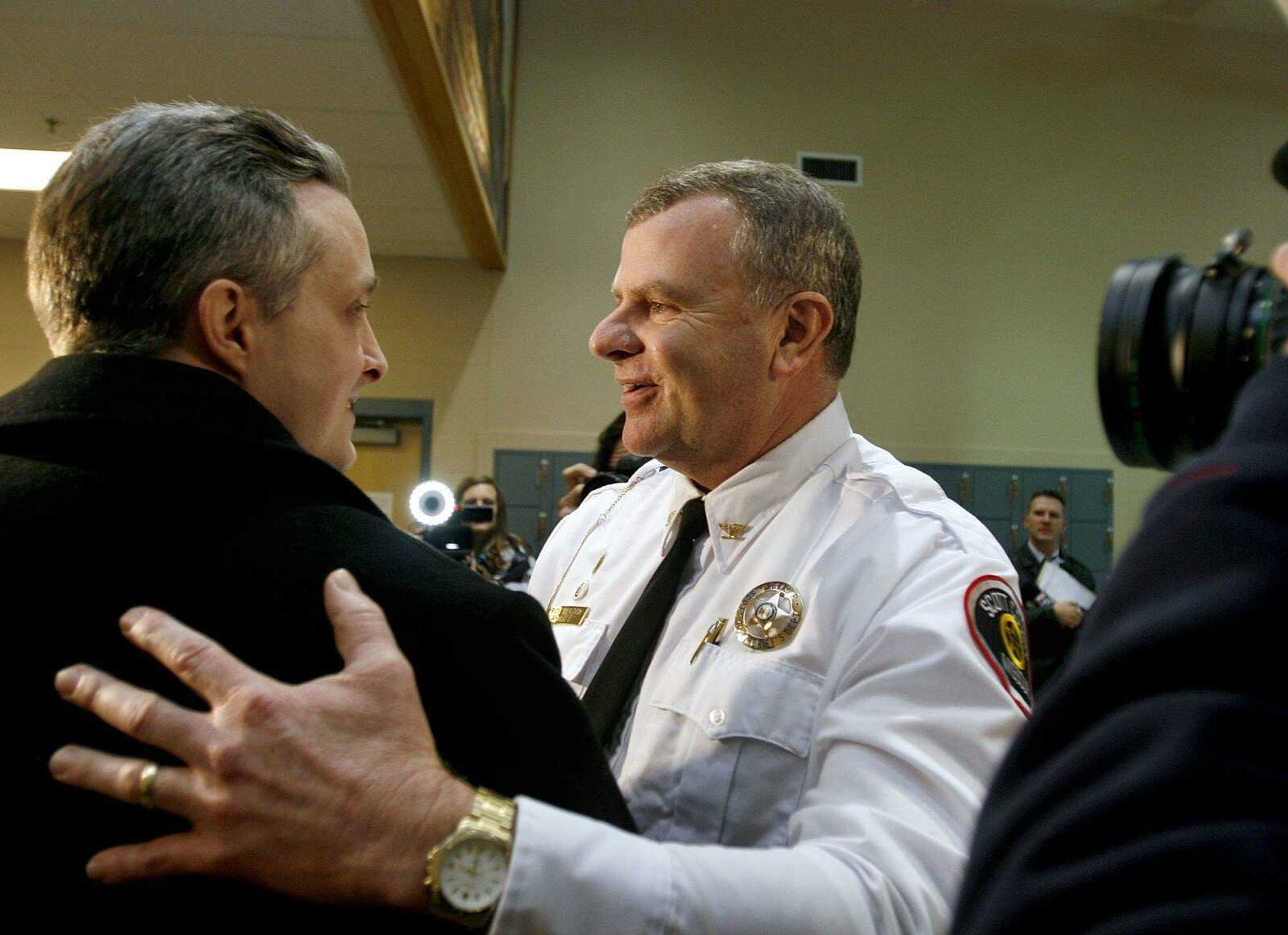 ELIZABETH DODD ~ edodd@semissourian.com
Sheriff Rick Walter hugs Joshua Kezer before Kezer left Jefferson City Correctional Center after being incarcerated 15 years Wednesday. Walter was responsible for reopening the murder investigation shortly after he took office in 2006.