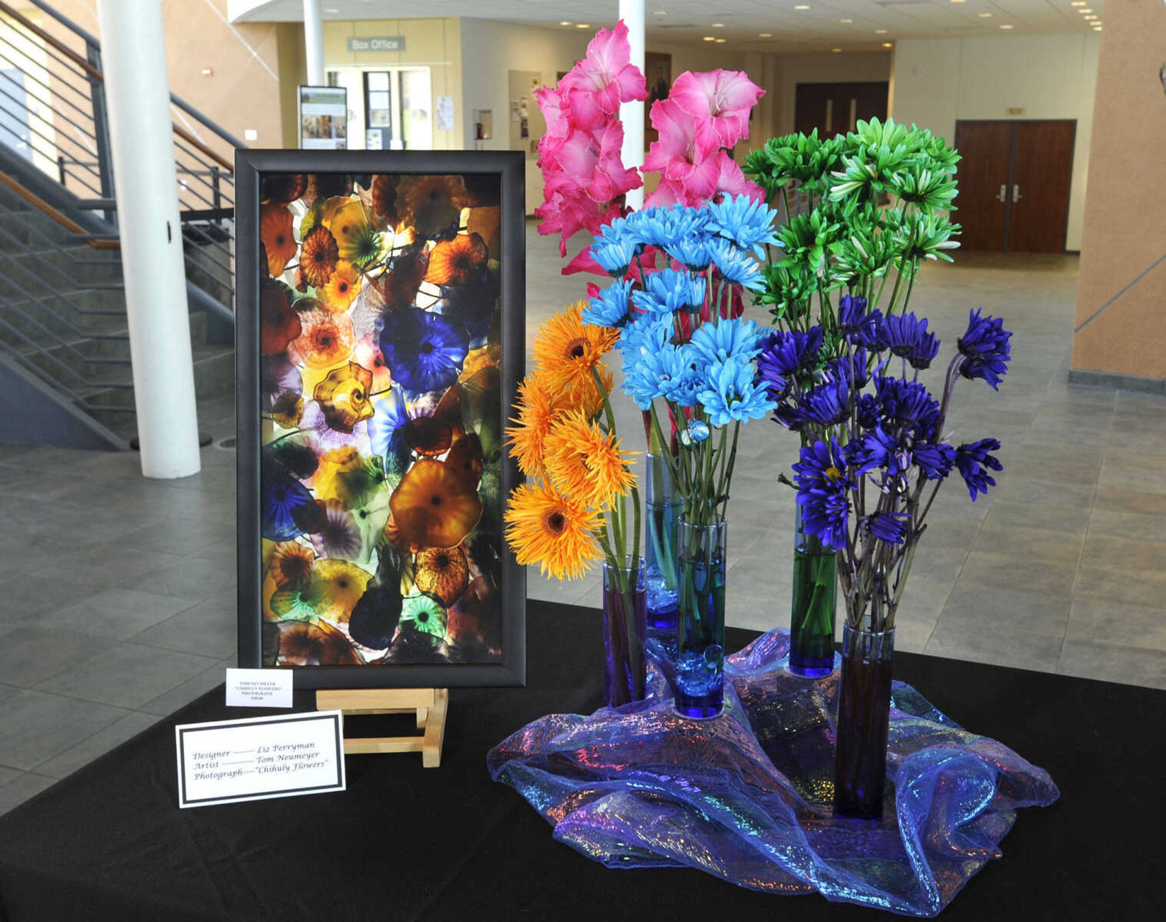 FRED LYNCH ~ flynch@semissourian.com
"Chihuly Flowers" photography by Tom Neumeyer, Designer: Liz Perryman
Cape Girardeau Art in Bloom brought local artists and garden clubs together for a show of art and its interpretation in floral arrangements on Saturday, May 7, 2011 at the River Campus. The event was presented by the Cape Girardeau Council of Garden Clubs and the Arts Council of Southeast Missouri.