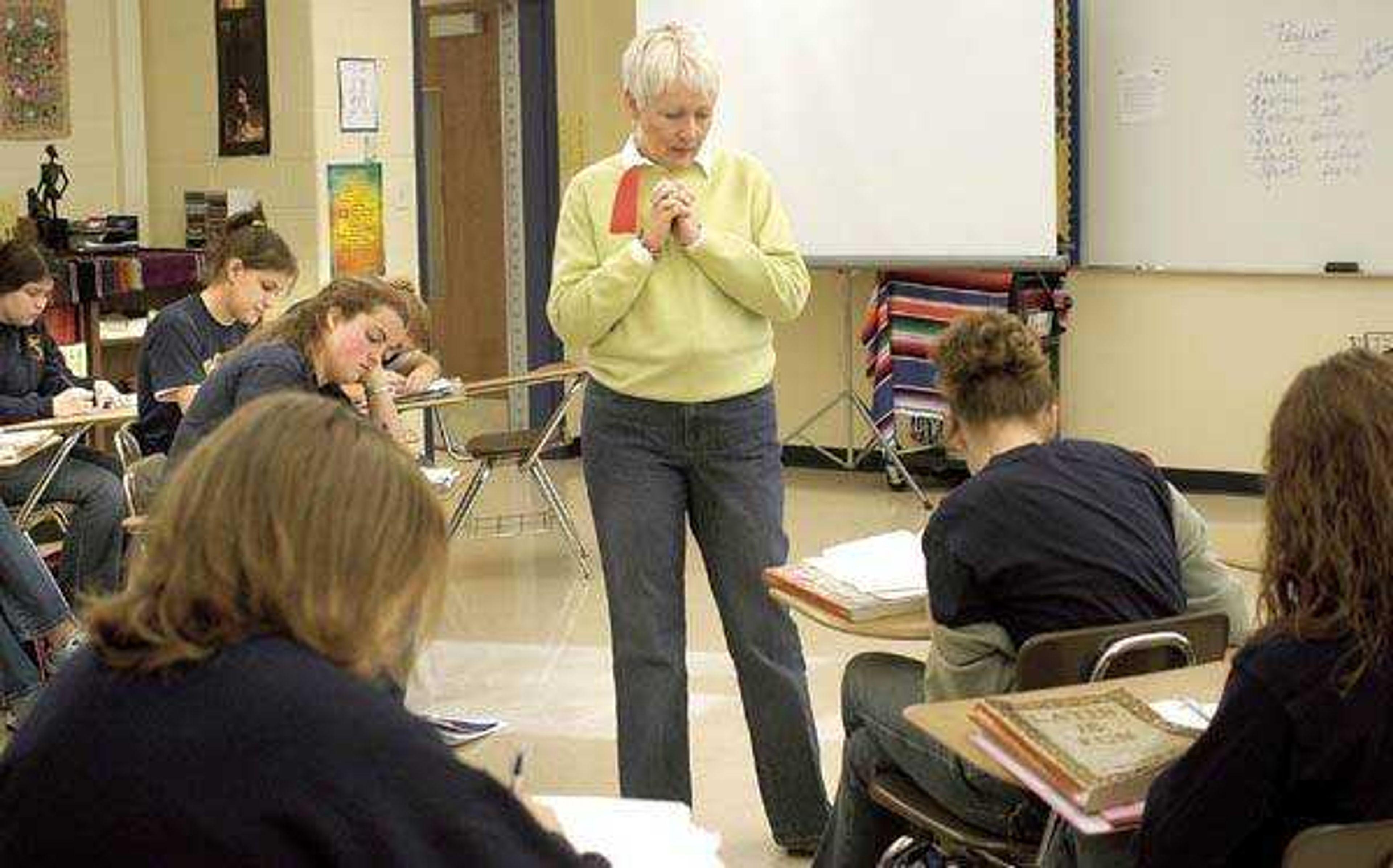 Candy Hahs taught Latin at Lutheran High School Monday. Latin is not offered in many schools in the area because it is hard to find teachers. (Diane L. Wilson)