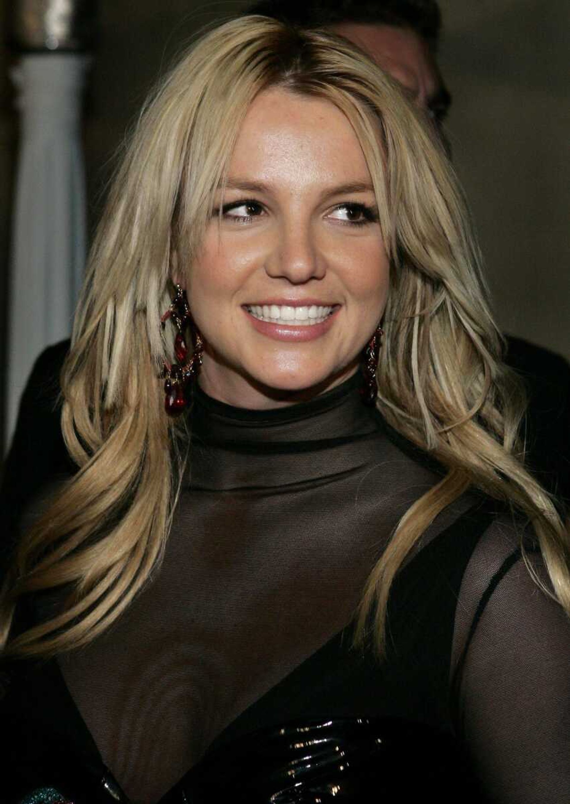 In a file photo Britney Spears arrives for a post Grammy Awards party  Feb. 8, 2006, in Beverly Hills, Calif.   Spears' estranged husband, Kevin Federline, and his lawyer were scheduled to appear Thursday, Feb. 22, 2007, at an emergency hearing in family law court.  The hearing comes amid increasingly bizarre behavior by Spears, which culminated with her reportedly checking into and out of two rehab centers in a week and shaving her head bald. (AP Photo/Danny Moloshok)