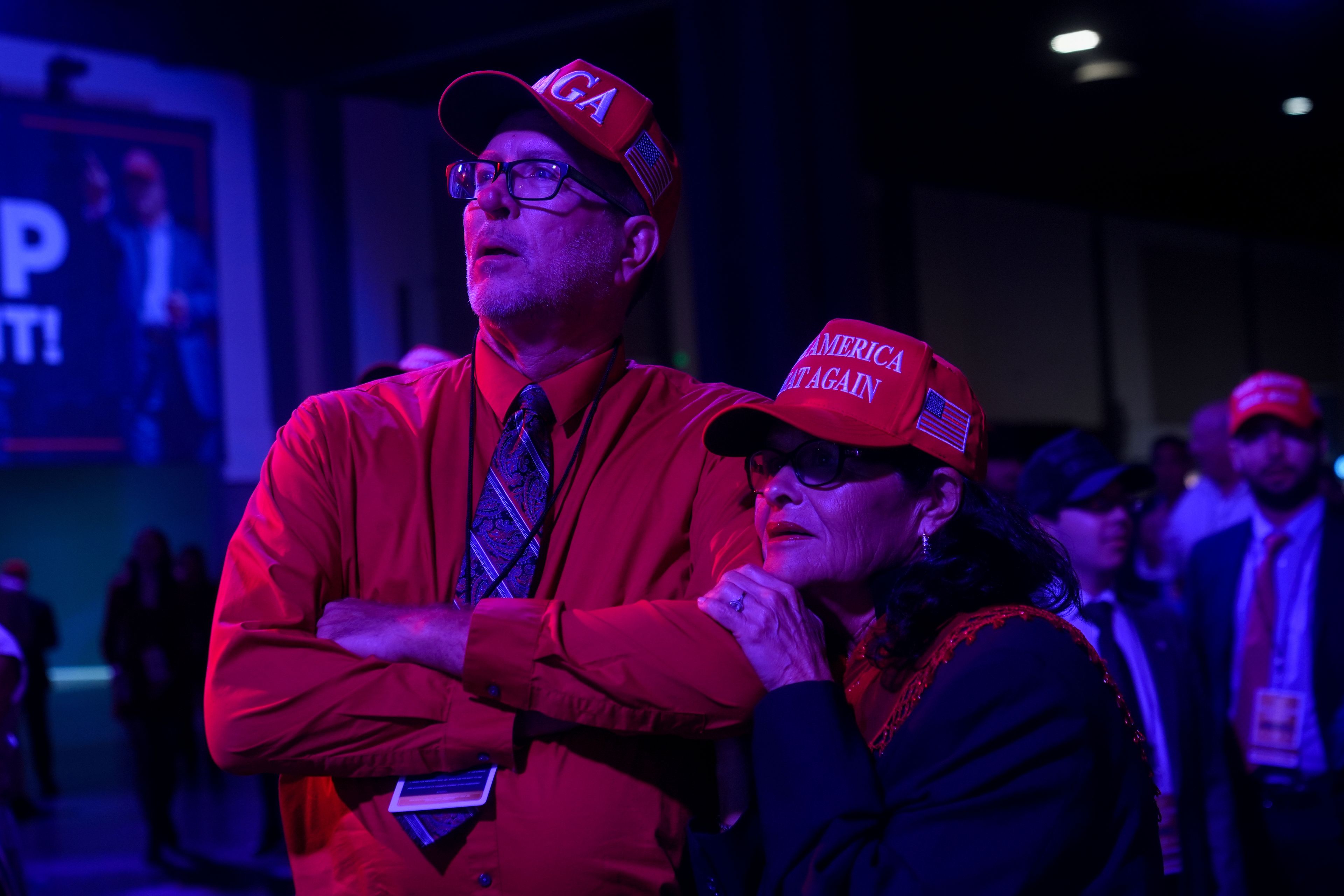 Mike and Dolly Rump of Madison, Fla., watch election results at an election night campaign watch party for Republican presidential nominee former President Donald Trump Tuesday, Nov. 5, 2024, in West Palm Beach, Fla.(AP Photo/Marta Lavandier)