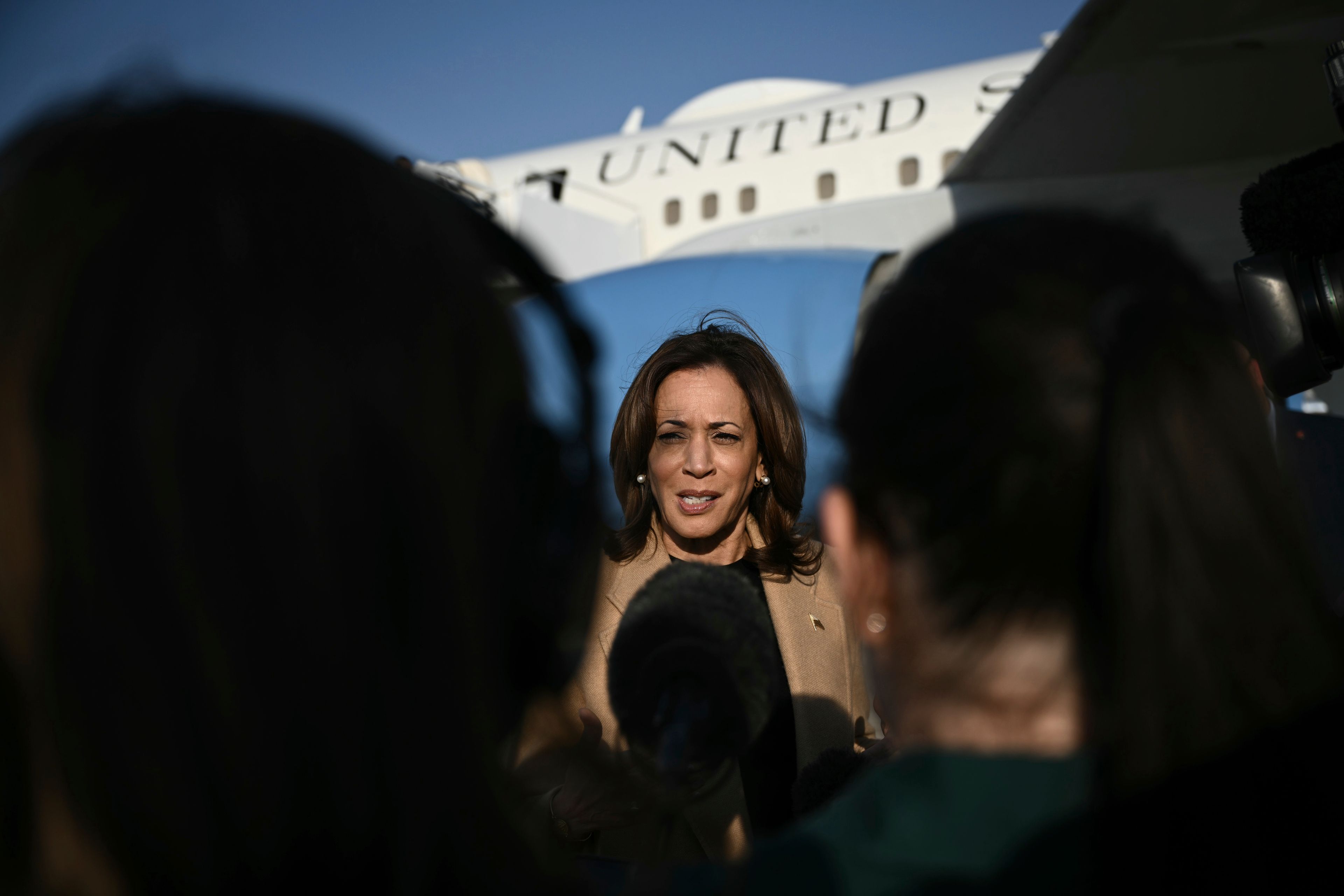 Democratic presidential nominee Vice President Kamala Harris speaks to the press before boarding Air Force Two at Joint Base Andrews, Md., Oct. 12, 2024, en route to North Carolina for a campaign event. (Brendan Smialowski/Pool via AP)