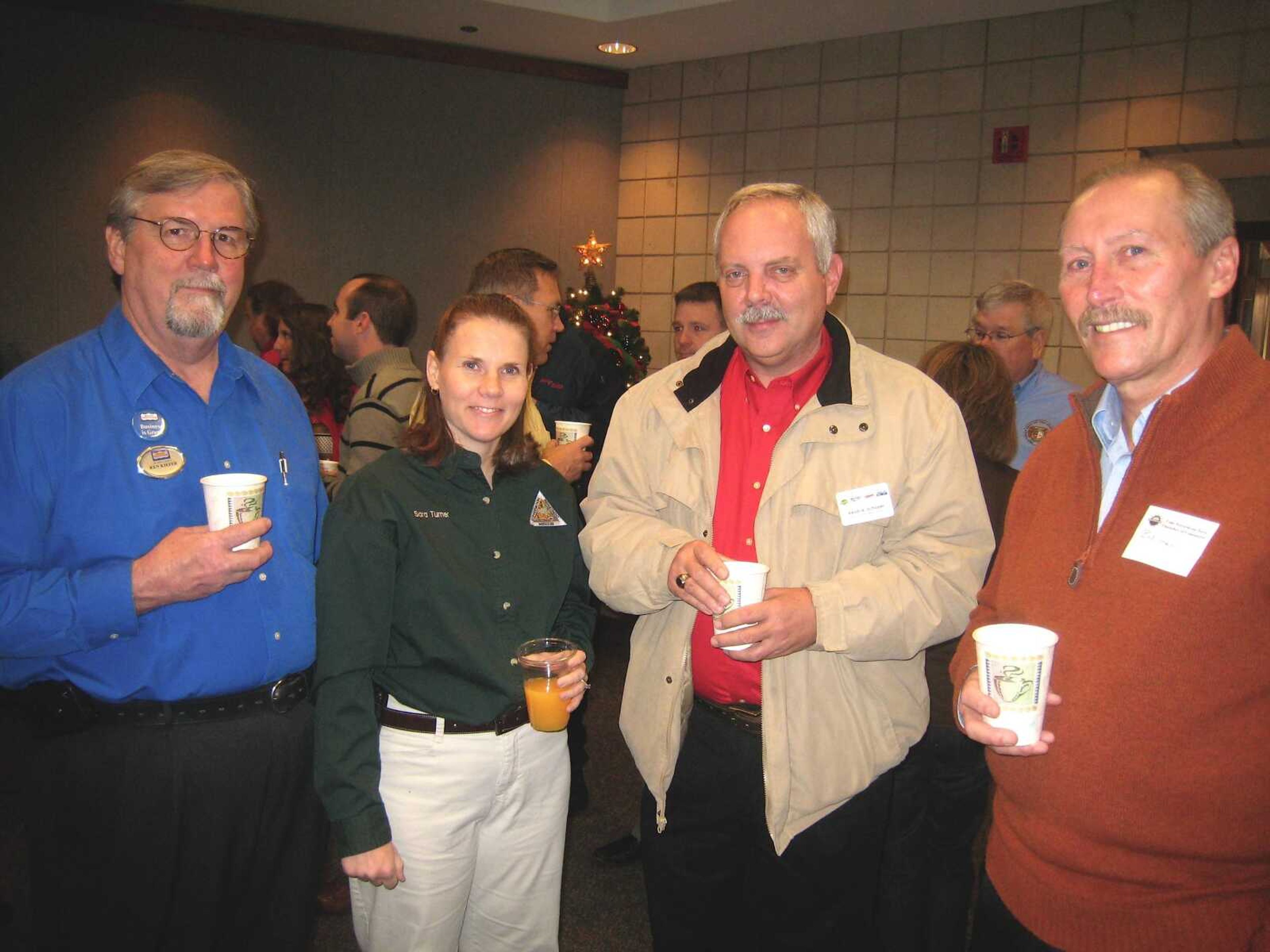 Ken Kiefer, Realty Executives; Sara Turner, Missouri Department of Conservation; Kevin A. Schaper, KGMO Radio; Bud Hunt, Southeast Missourian; at the Cape Girardeau Area Chamber of Commerce First Friday Coffee Friday, Jan. 4, at the Show Me Center in Cape Girardeau.