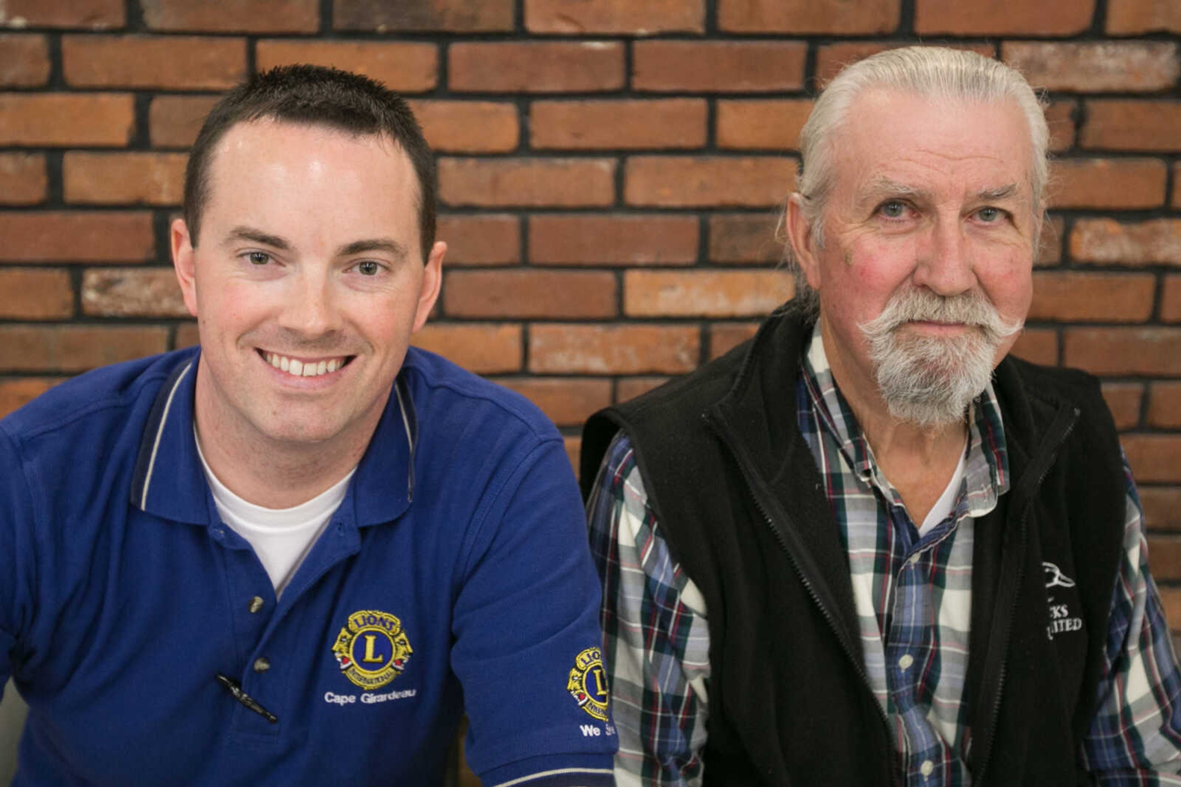 GLENN LANDBERG ~ glandberg@semissourian.com

Justin Albright, left, and Richard Allgood pose for a photo during the 78th annual Noon Lions Club Pancake Day Wednesday, March 9, 2016 at the Arena Building in Cape Girardeau.