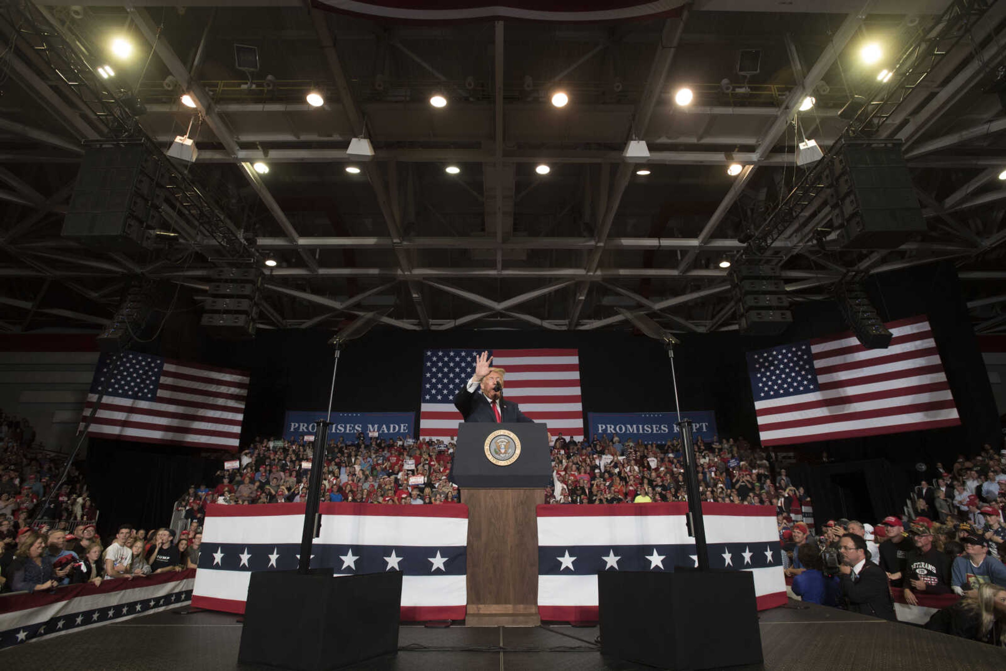 President Donald Trump waves to the crowd during a Make America Great Again rally Monday, Nov. 5, 2018, at the Show Me Center in Cape Girardeau.