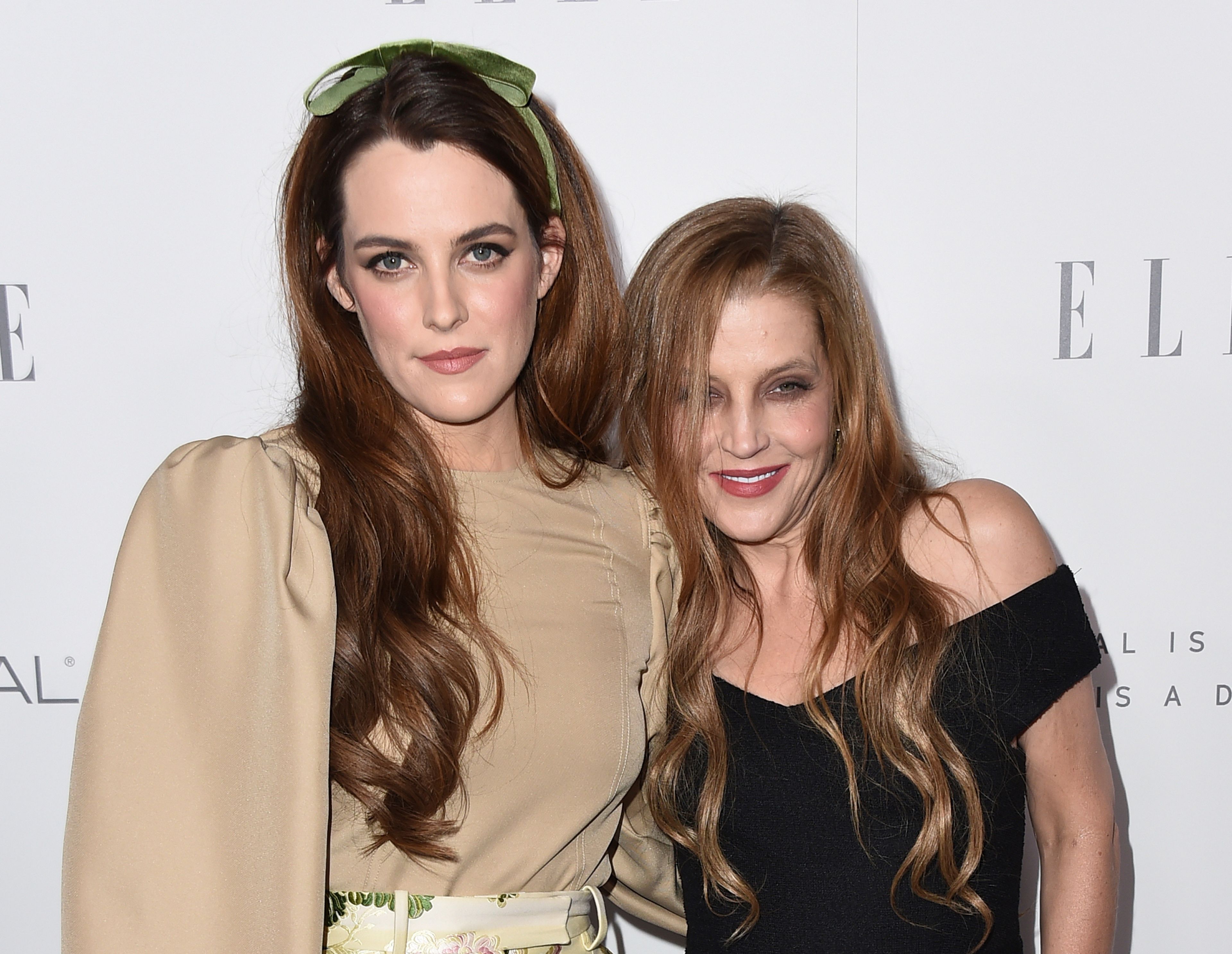 FILE - Riley Keough, left, and her mother Lisa Marie Presley arrive at the 24th annual ELLE Women in Hollywood Awards on Oct. 16, 2017, in Los Angeles. (Photo by Jordan Strauss/Invision/AP, File)