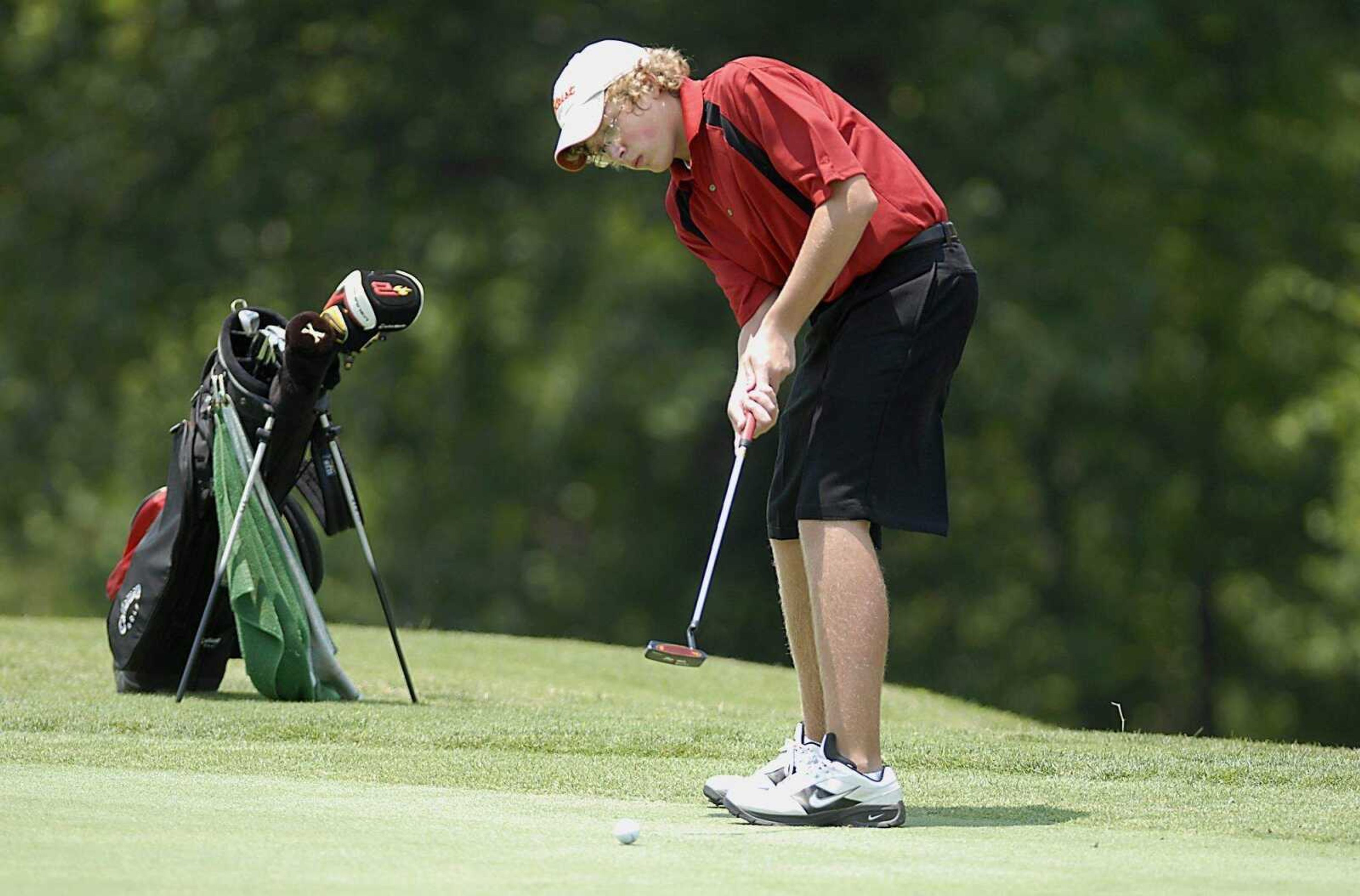 KIT DOYLE ~ kdoyle@semissourian.com
Fifteen-year-old Logan Robey, of Dexter, watched his putt on the second hole Wednesday, June 25, 2008, during the PGA Gateway Junior Series tournament at Bent Creek in Jackson.