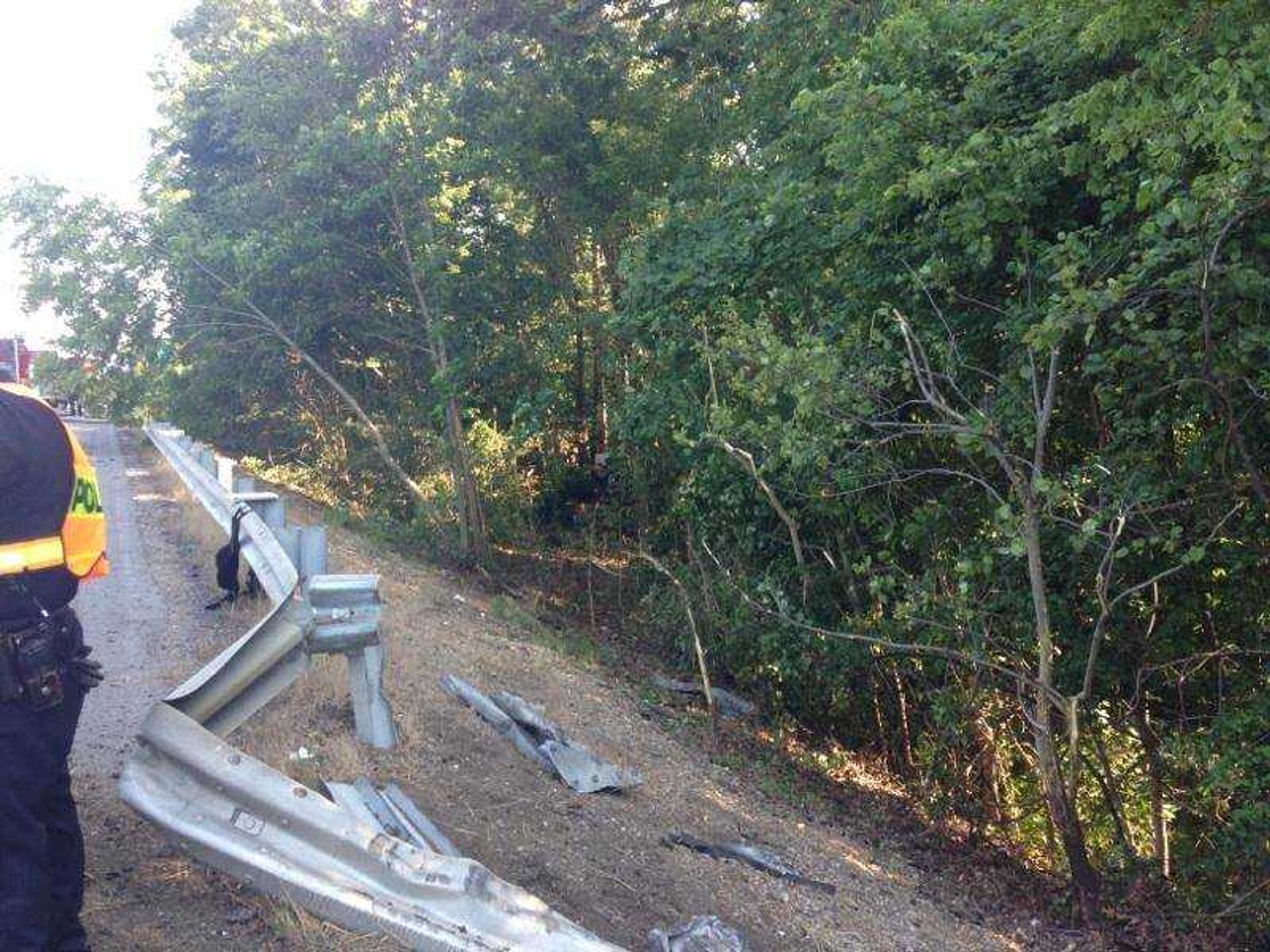 This cellphone picture shows the spot where a truck went through a guardrail near the 98 mile marker on southbound Interstate 55 on Wednesday. One person was killed, the county coroner said. (Adam Vogler)