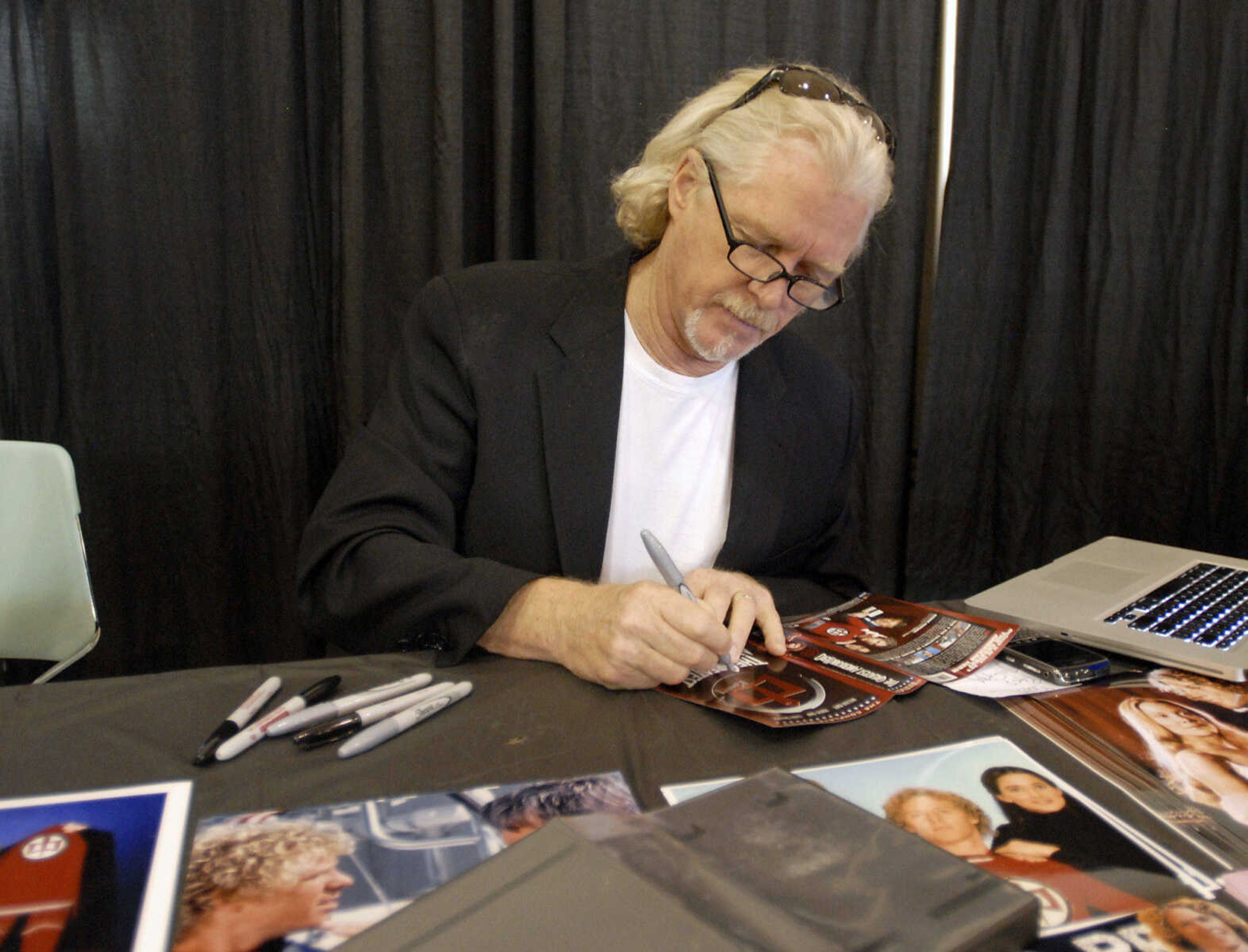 KRISTIN EBERTS ~ keberts@semissourian.com

Actor William Katt, star of "The Greatest American Hero" signs autographs during the sixth annual Cape Comic Con on Saturday, June 25, 2011, at the Osage Centre in Cape Girardeau.