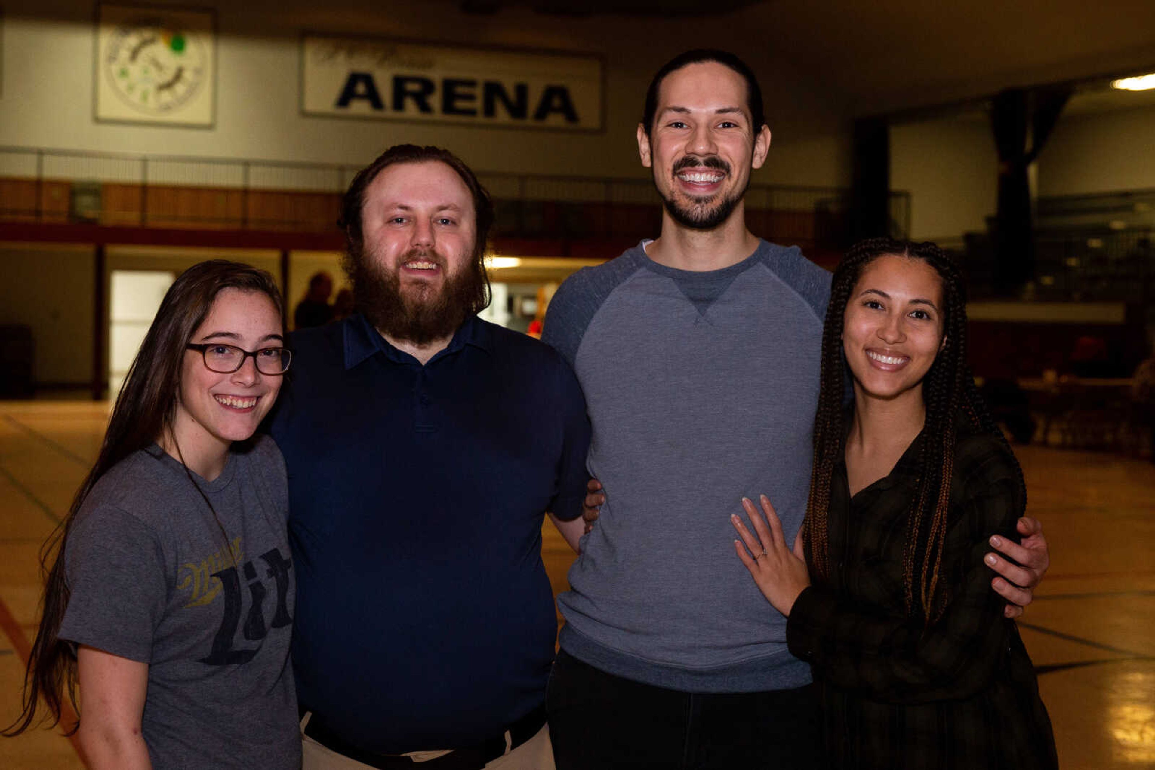 Andrew and Zoey Miller pose with Sierra Elliott and Kaleb Cotton at the community social.