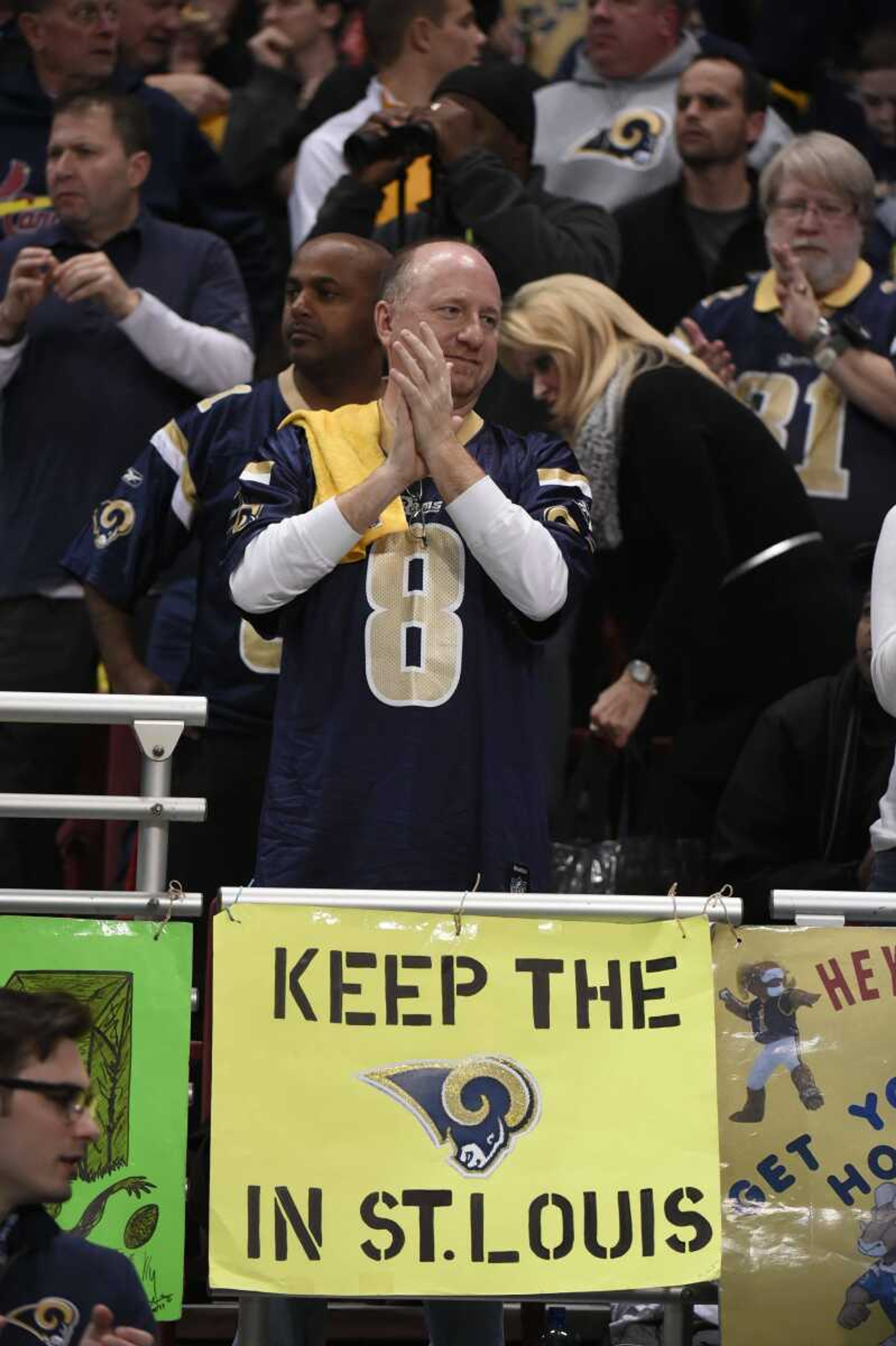 A St. Louis Rams fan is seen in the stands during the first quarter of an NFL football game between the St. Louis Rams and the Tampa Bay Buccaneers on Thursday, Dec. 17, 2015, in St. Louis. The game could be the final home contest for the St. Louis Rams if owner Stan Kroenke is allowed to move the team to Los Angeles next season. (AP Photo/L.G. Patterson)