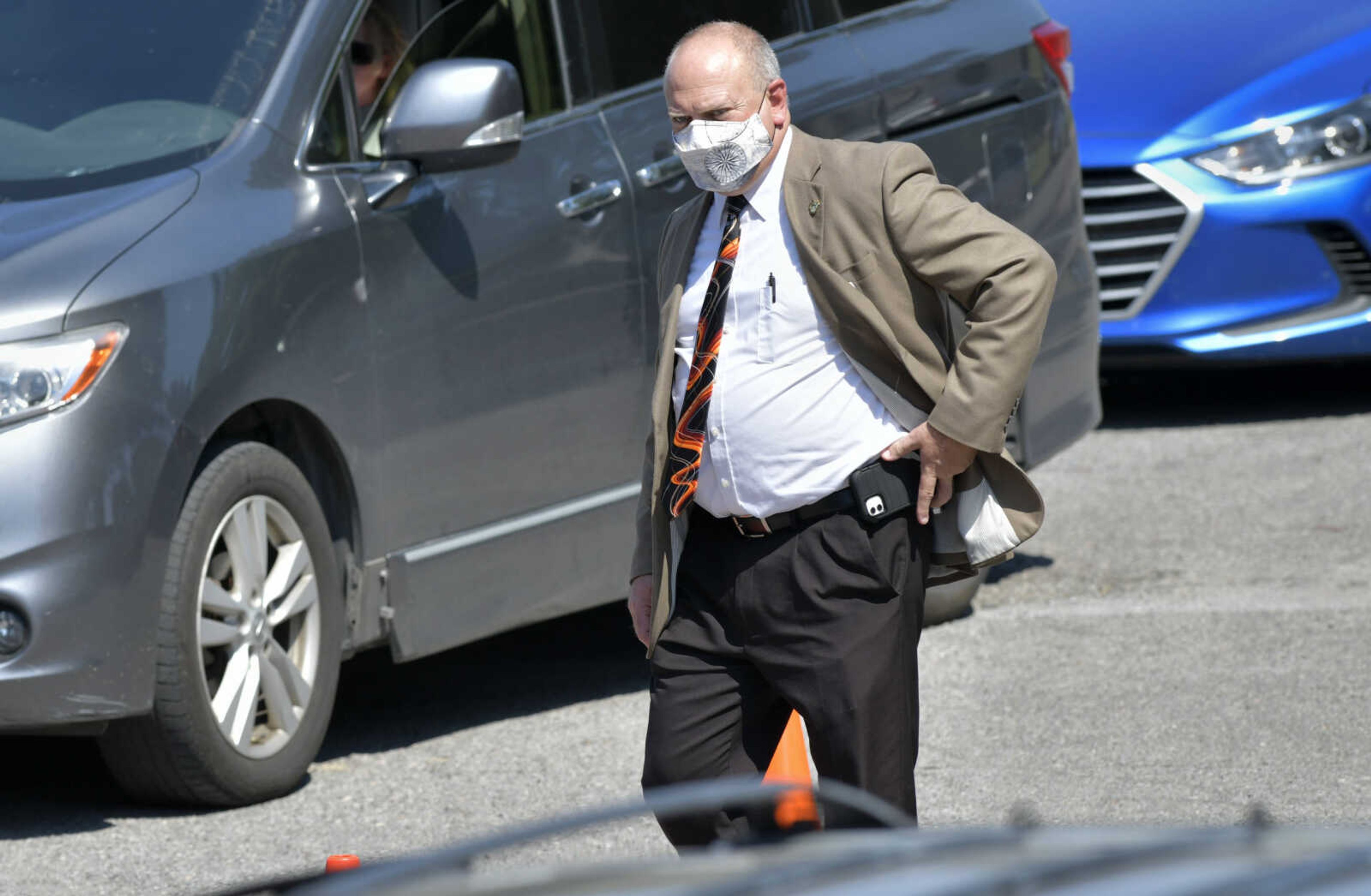 Terry W. Kitchen Central Junior High School assistant principal Alan Bruns helps direct traffic during lunch Monday, Aug. 24, 2020, in Cape Girardeau.