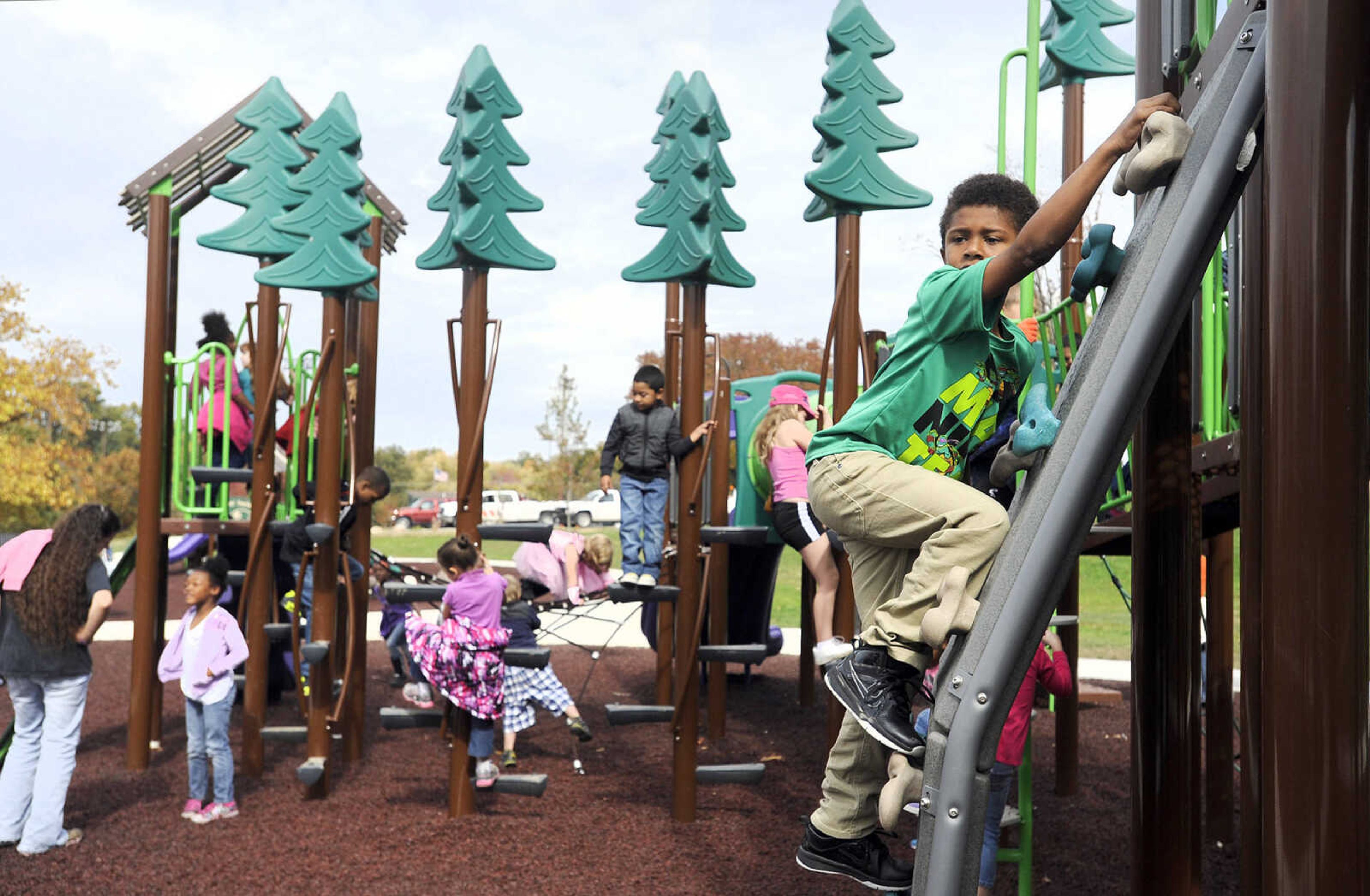 LAURA SIMON ~ lsimon@semissourian.com

Children test out the new playground at Capaha Park, Friday, Oct. 23, 2015, in Cape Girardeau.