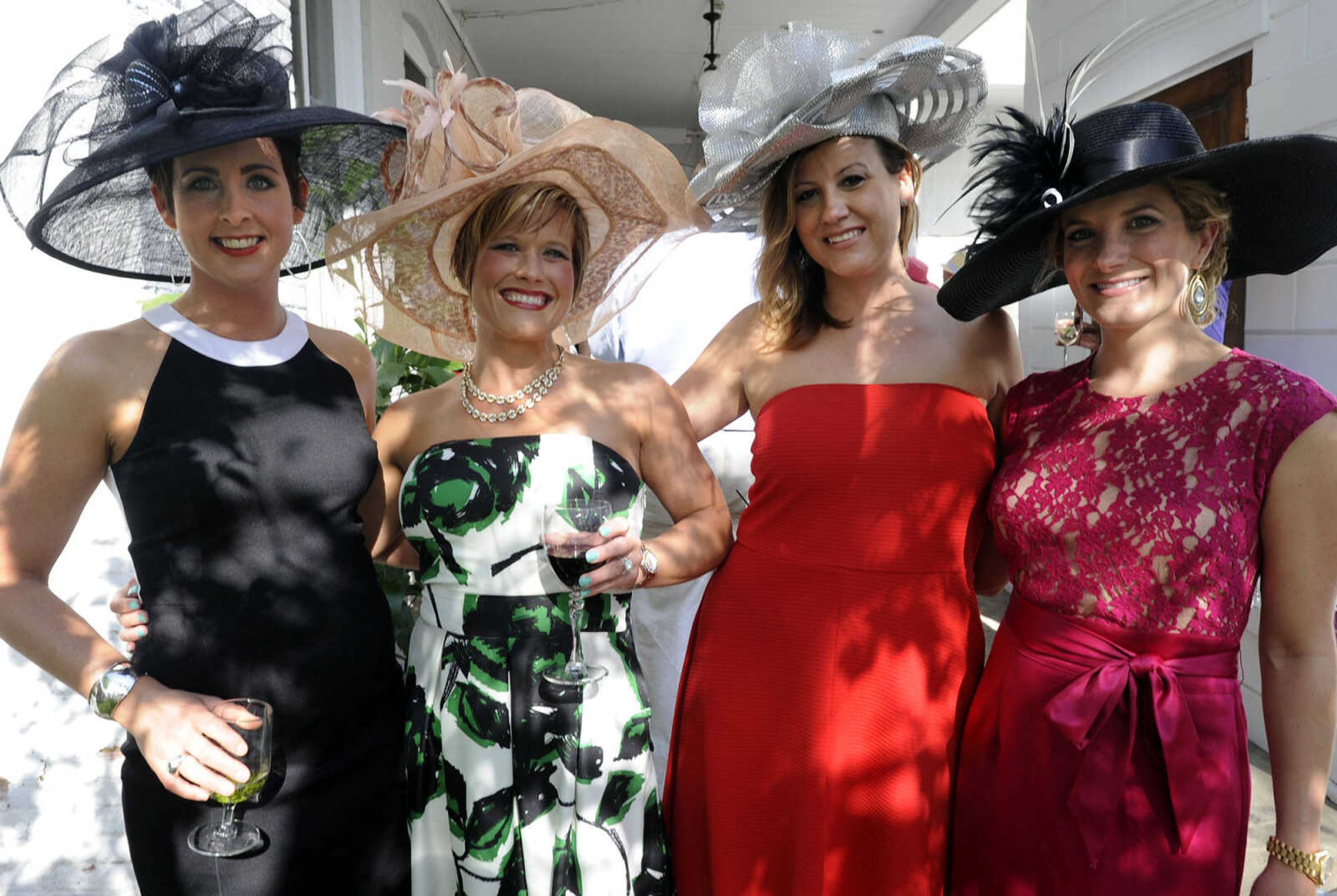 FRED LYNCH ~ flynch@semissourian.com
Erin Wilson, left, Leah Mosley, Angel Hahn and Samantha Rhodes pose for a photo at the Derby Party on Saturday, May 3, 2014 at the Glenn House in Cape Girardeau.