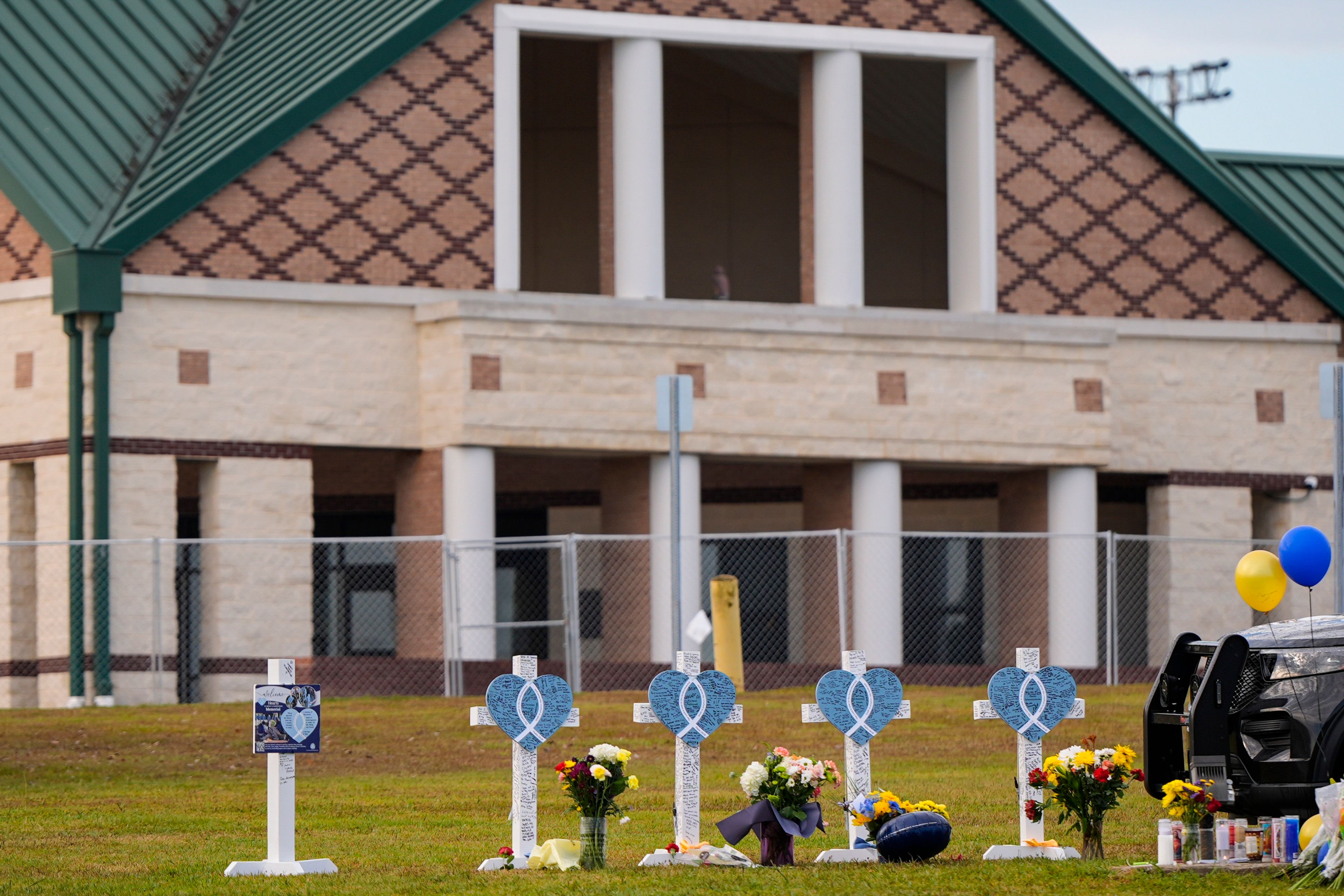 A memorial is seen at Apalachee High School after the Wednesday school shooting, Saturday, Sept. 7, 2024, in Winder, Ga. (AP Photo/Mike Stewart)