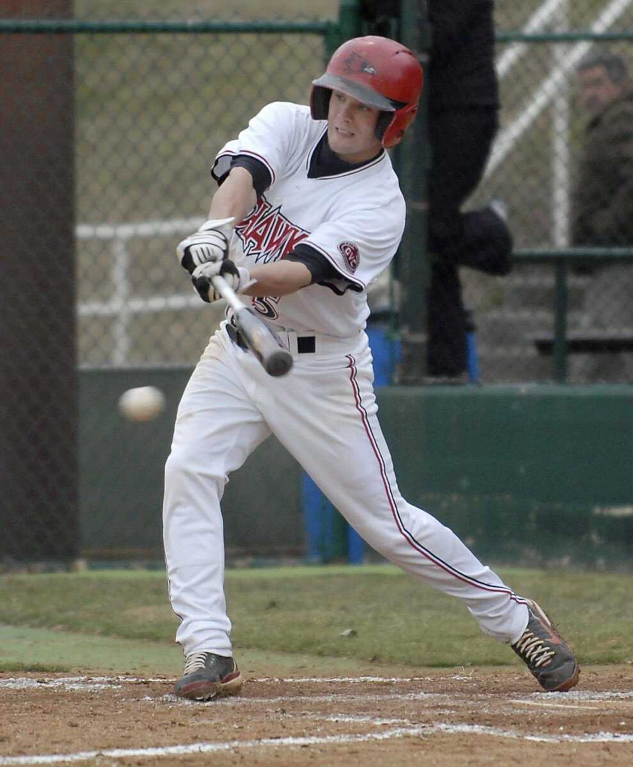 KIT DOYLE ~ kdoyle@semissourian.comTony Spencer grounds out Tuesday, February 24, 2009, in the Redhawks home opener at Capaha Field.