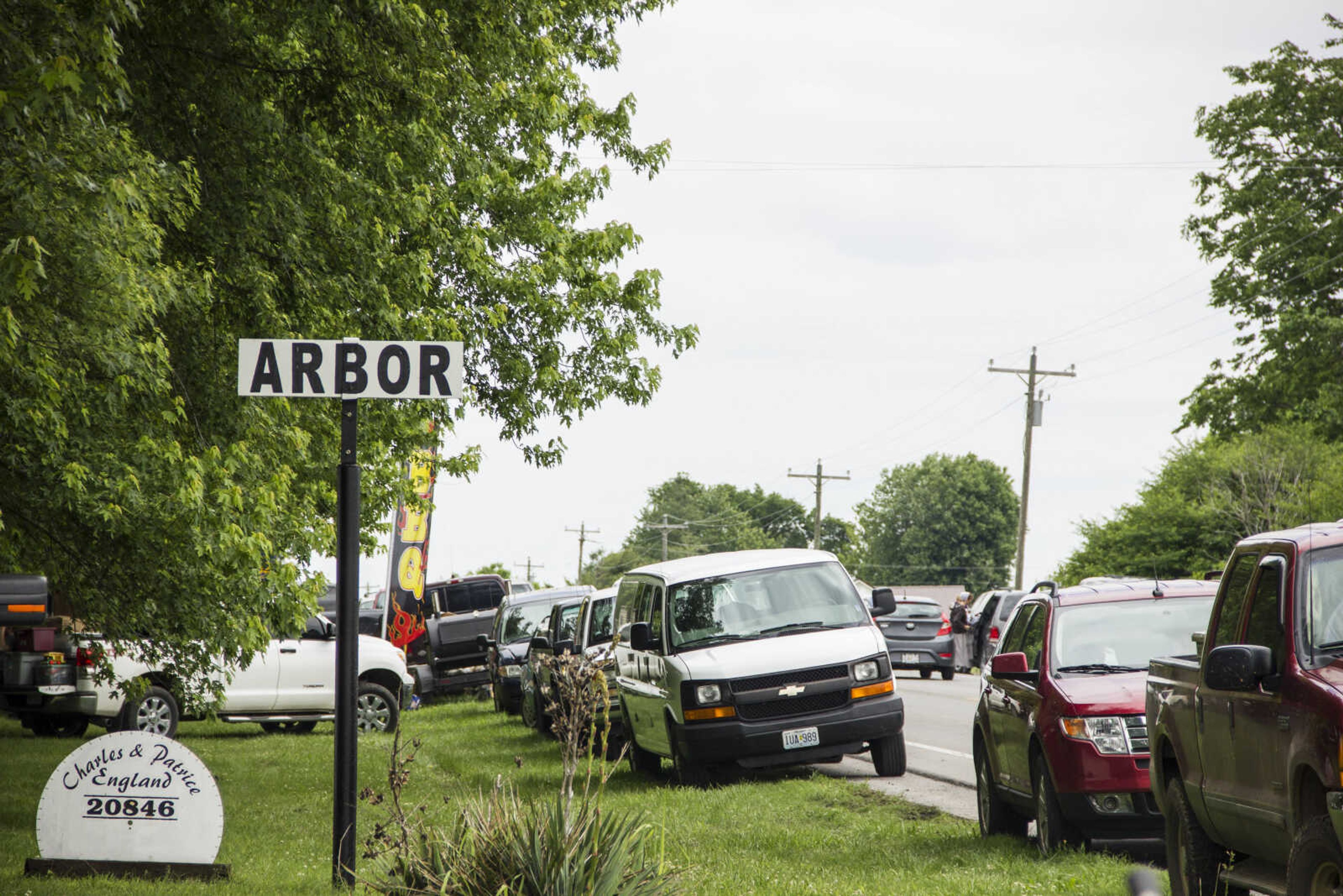 CAROL KELLISON ~ photo@semissourian.com

Cars line the side of Highway 25 in Arbor, Missouri for the 100-mile yard sale on Thursday May 22, 2015.