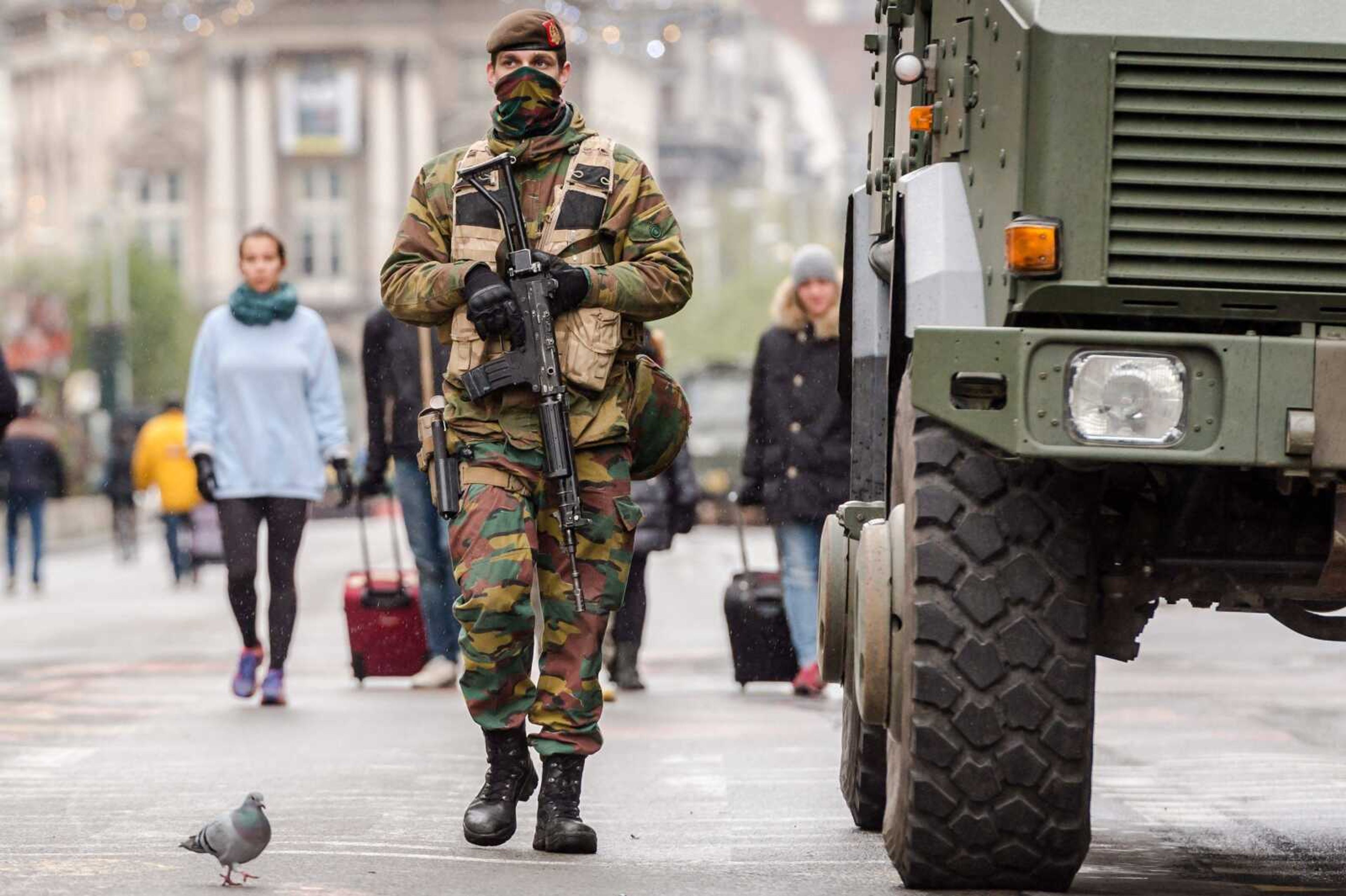 A Belgian Army soldier patrols Sunday on a main boulevard in Brussels. (Geert Vanden Wijngaert ~ Associated Press)