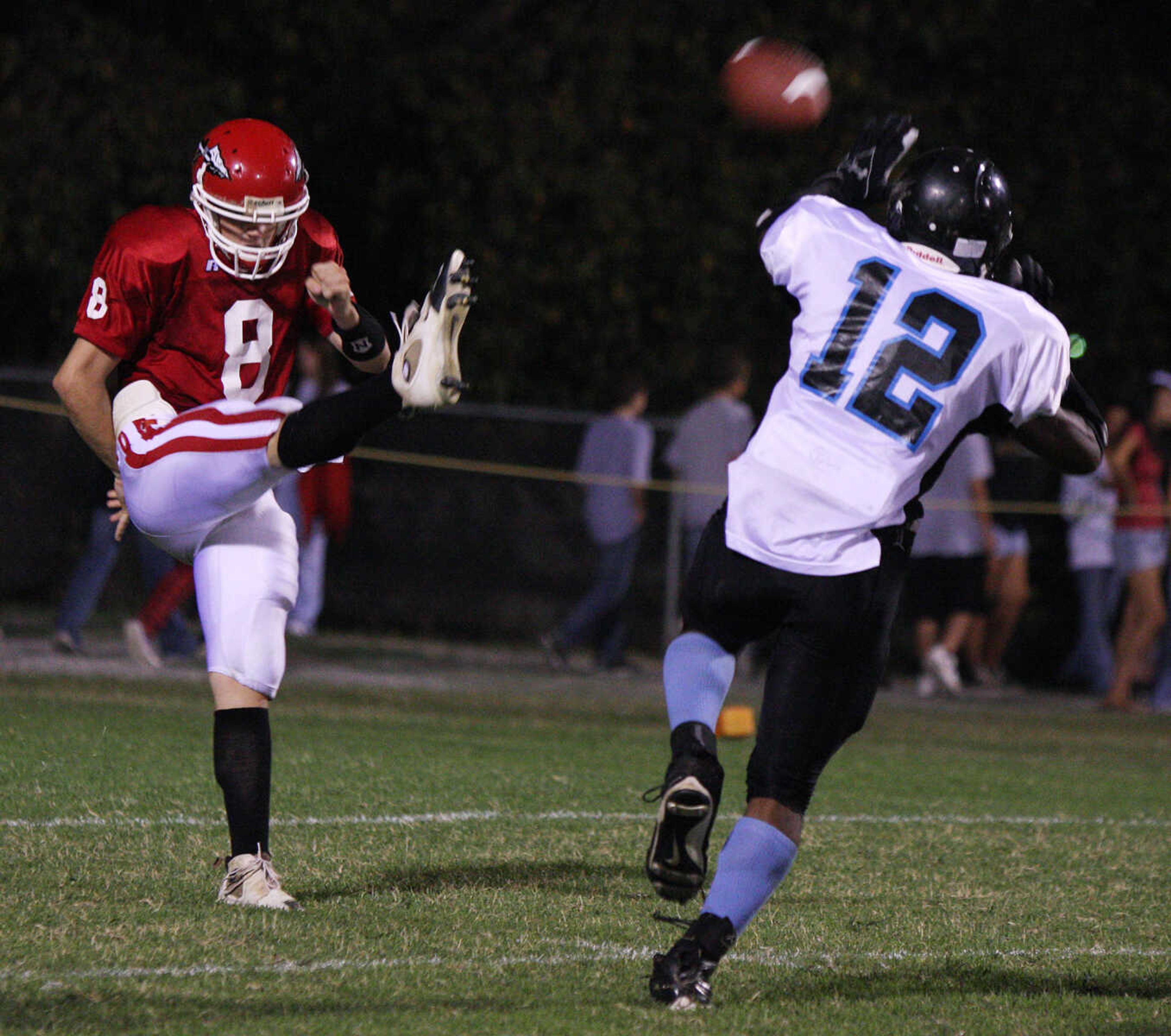 A fourth-down punt by Jackson's Bobby Clark is nearly blocked by Gateway Tech's Anthony Williams.