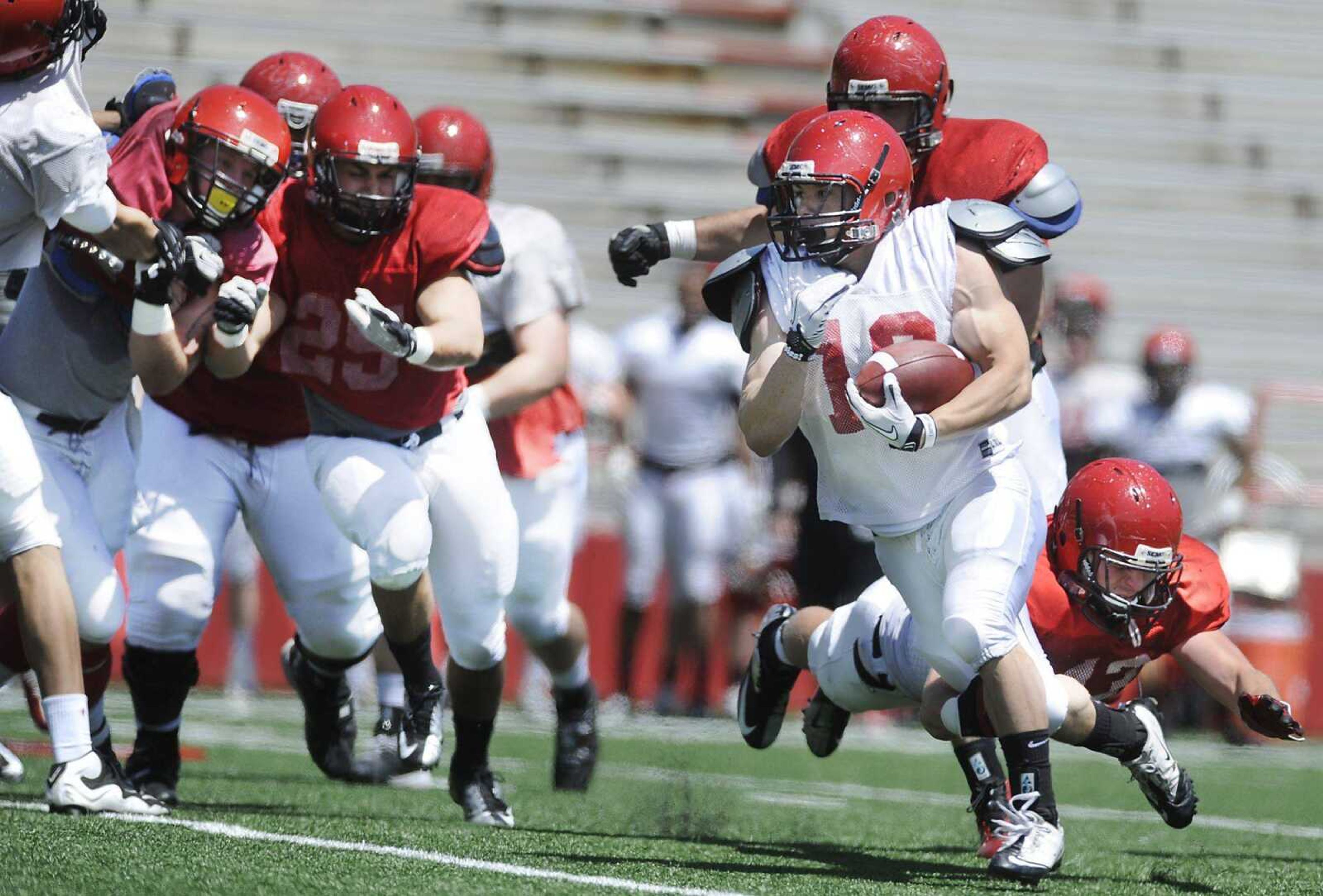 Southeast Missouri State running back Tyson Estes cuts down field during a scrimmage Saturday at Houck Stadium. Estes, a graduate of Chaffee High School, scored one of the three touchdowns by Southeast&#8217;s offense. (ADAM VOGLER)