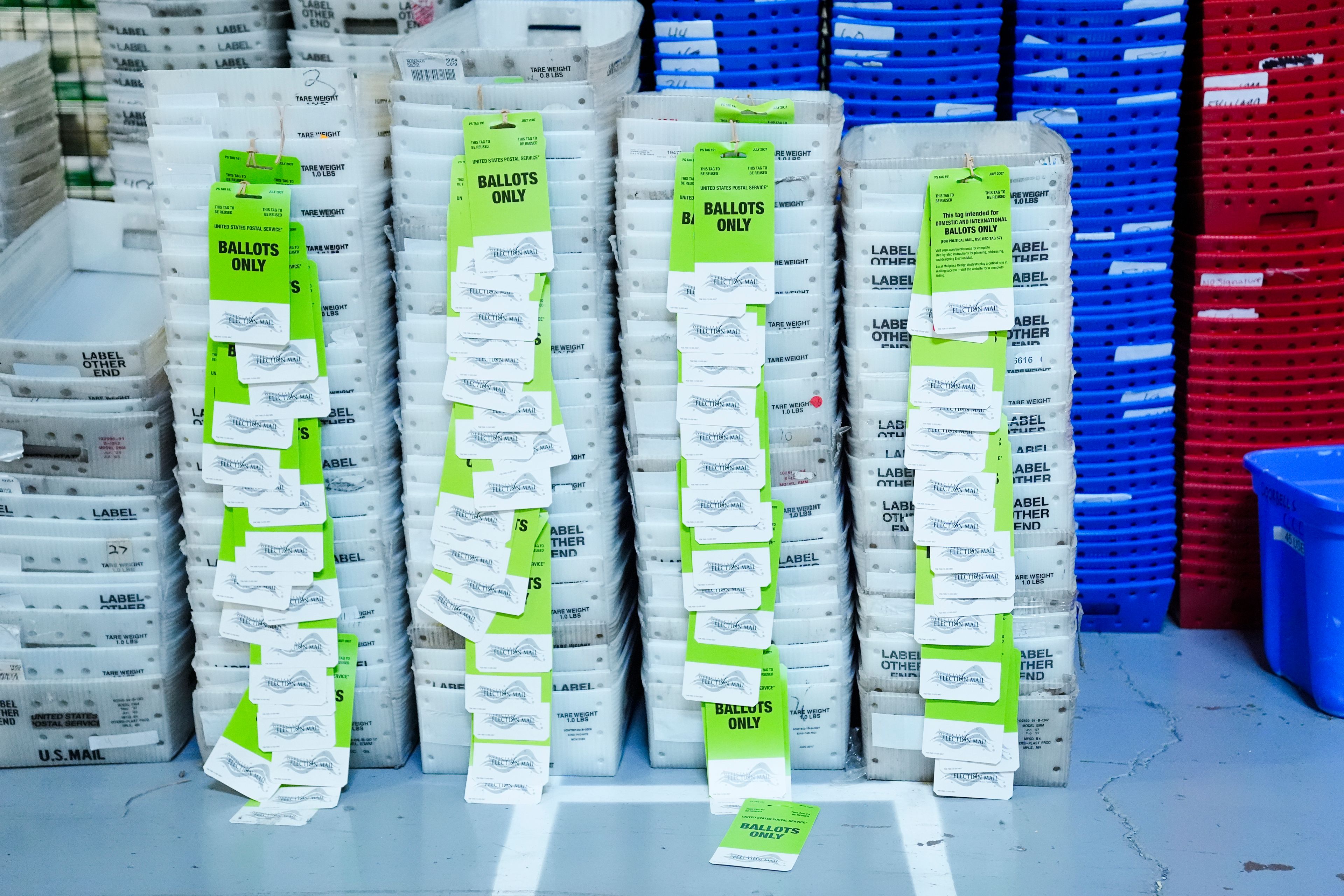 Empty bins are shown at the Philadelphia Election Warehouse, in Philadelphia, Friday, Oct. 25, 2024. (AP Photo/Matt Rourke)