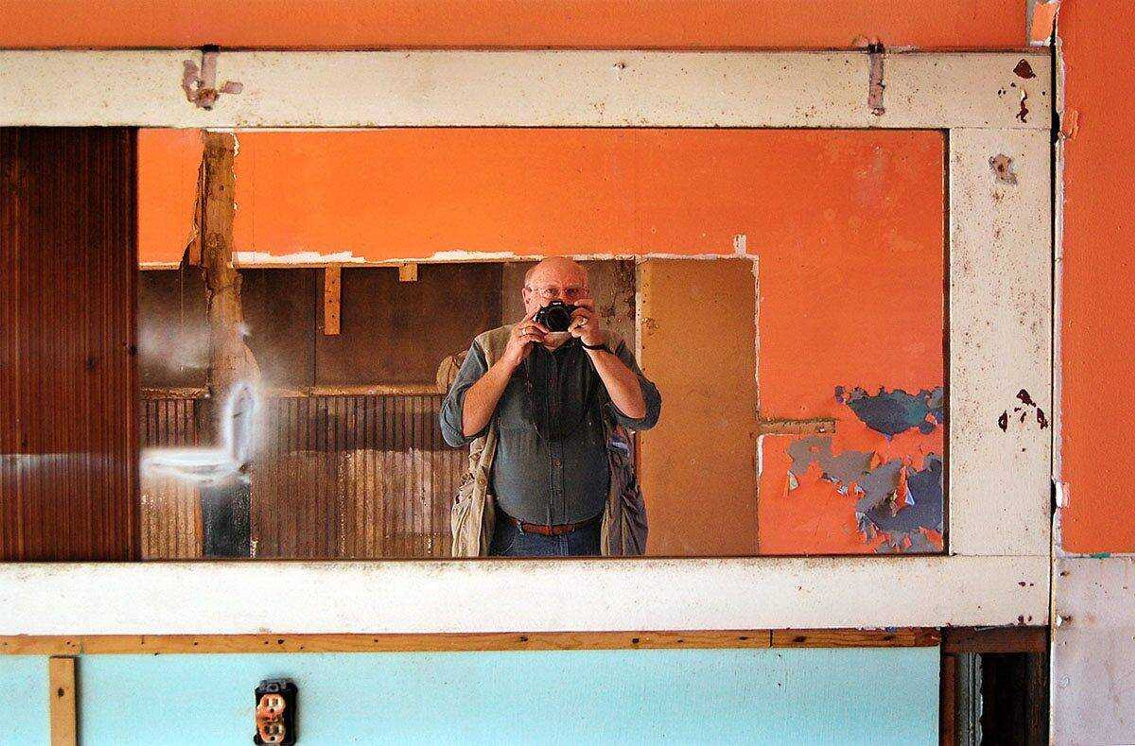 Ken Steinhoff self-portrait in old Stylerite Barber Shop, 312 S. Sprigg St., on Oct. 24.