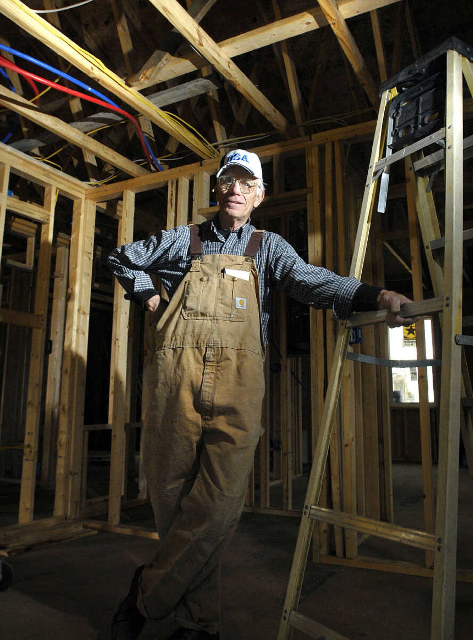 Ervin Belcher inside a new home he is building in Morley, Mo. Friday, February 24, 2012. (Laura Simon)