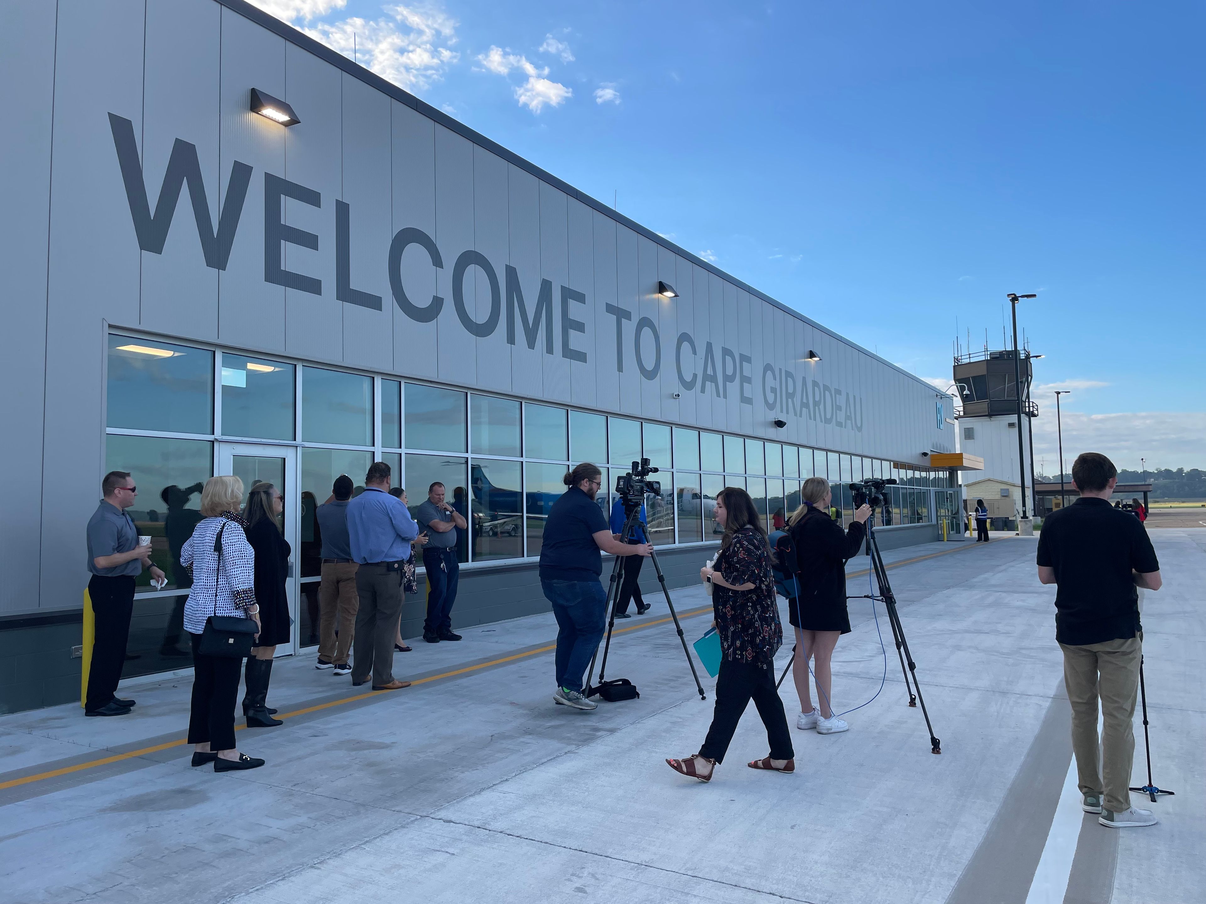 Media members set up on Oct. 1, 2024, before a water cannon ceremony at the new airport terminal in Cape Girardeau.