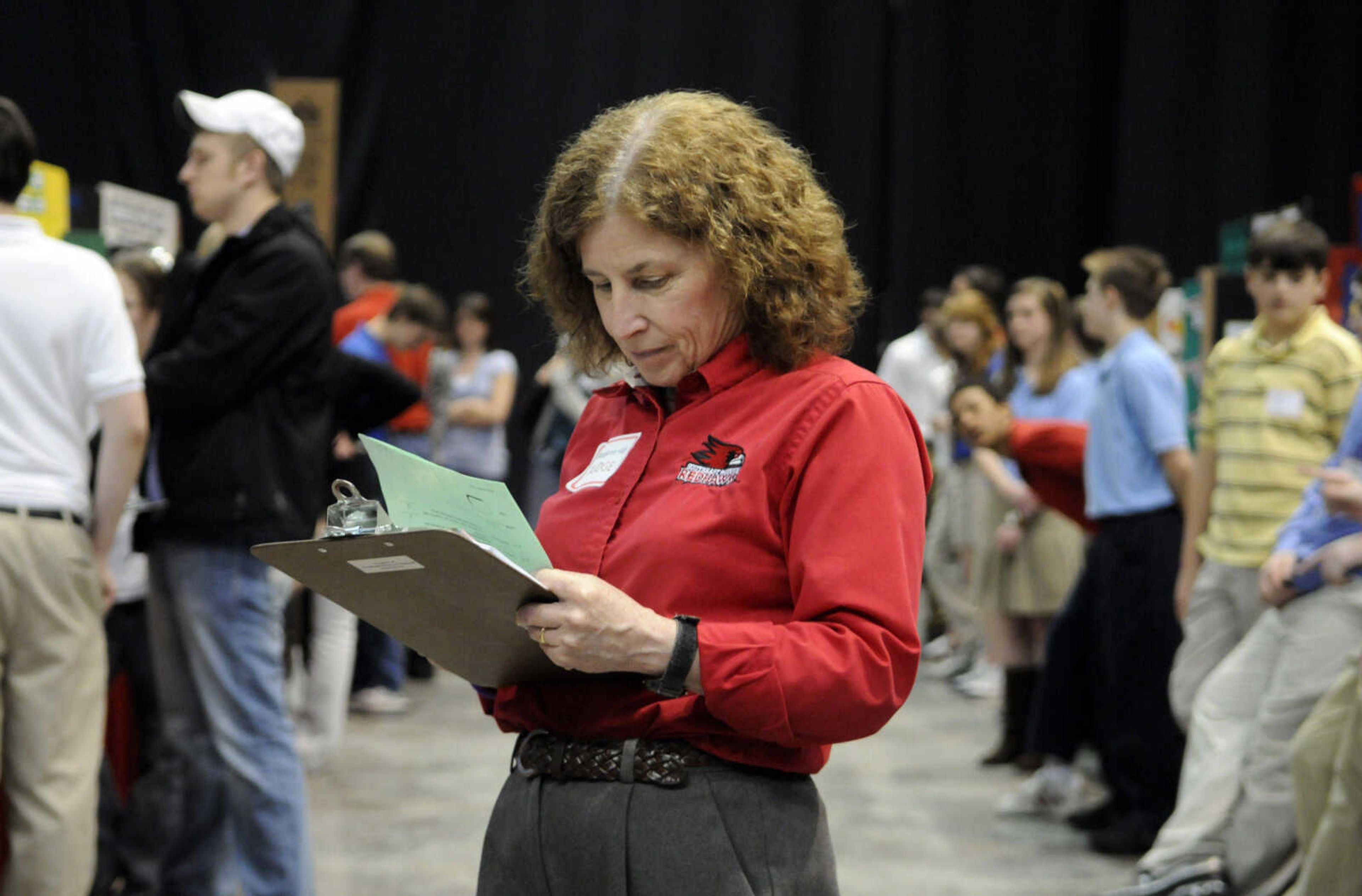 KRISTIN EBERTS ~ keberts@semissourian.com

Science fair judge Margaret Hill makes notes on projects during the 54th Annual Southeast Missouri Regional Science Fair at the Show Me Center on Tuesday, March 9, 2010.