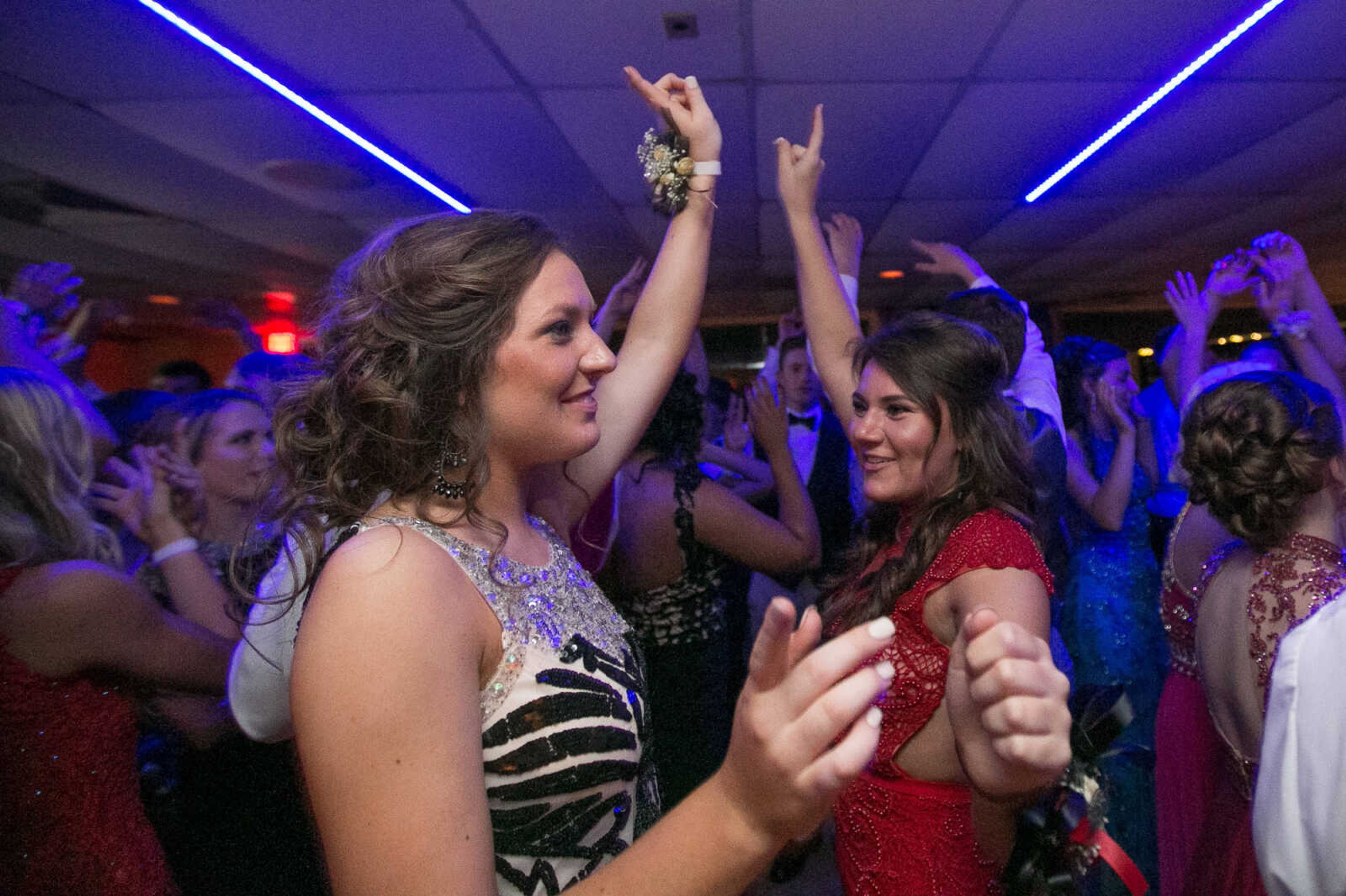 GLENN LANDBERG ~ glandberg@semissourian.com

Jordan Hecht, left, and Logan Franke take to the dance floor during the Saxony Lutheran High School's "Classique Magnifique" prom, Saturday, April 23, 2016, at the Cape Girardeau Elks Lodge.