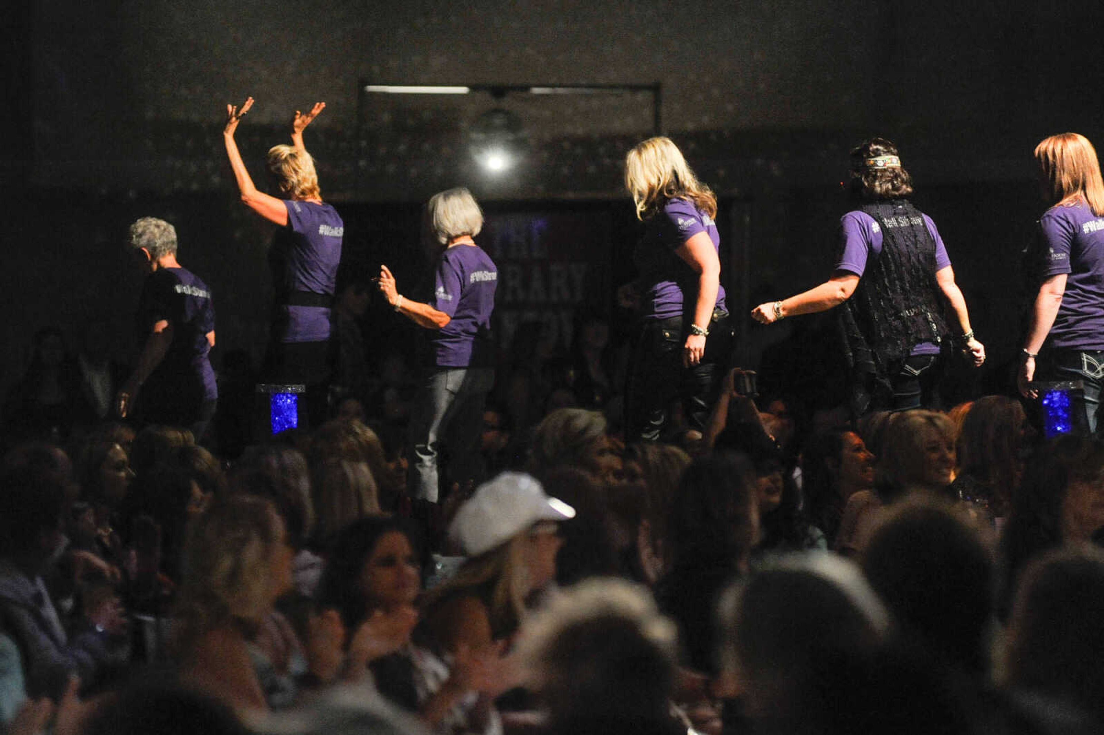 GLENN LANDBERG ~ glandberg@semissourian.com

Hostesses for the evening make their way down the runway before the start of the VintageNOW fashion show at the Osage Centre on Saturday, October 24, 2015.