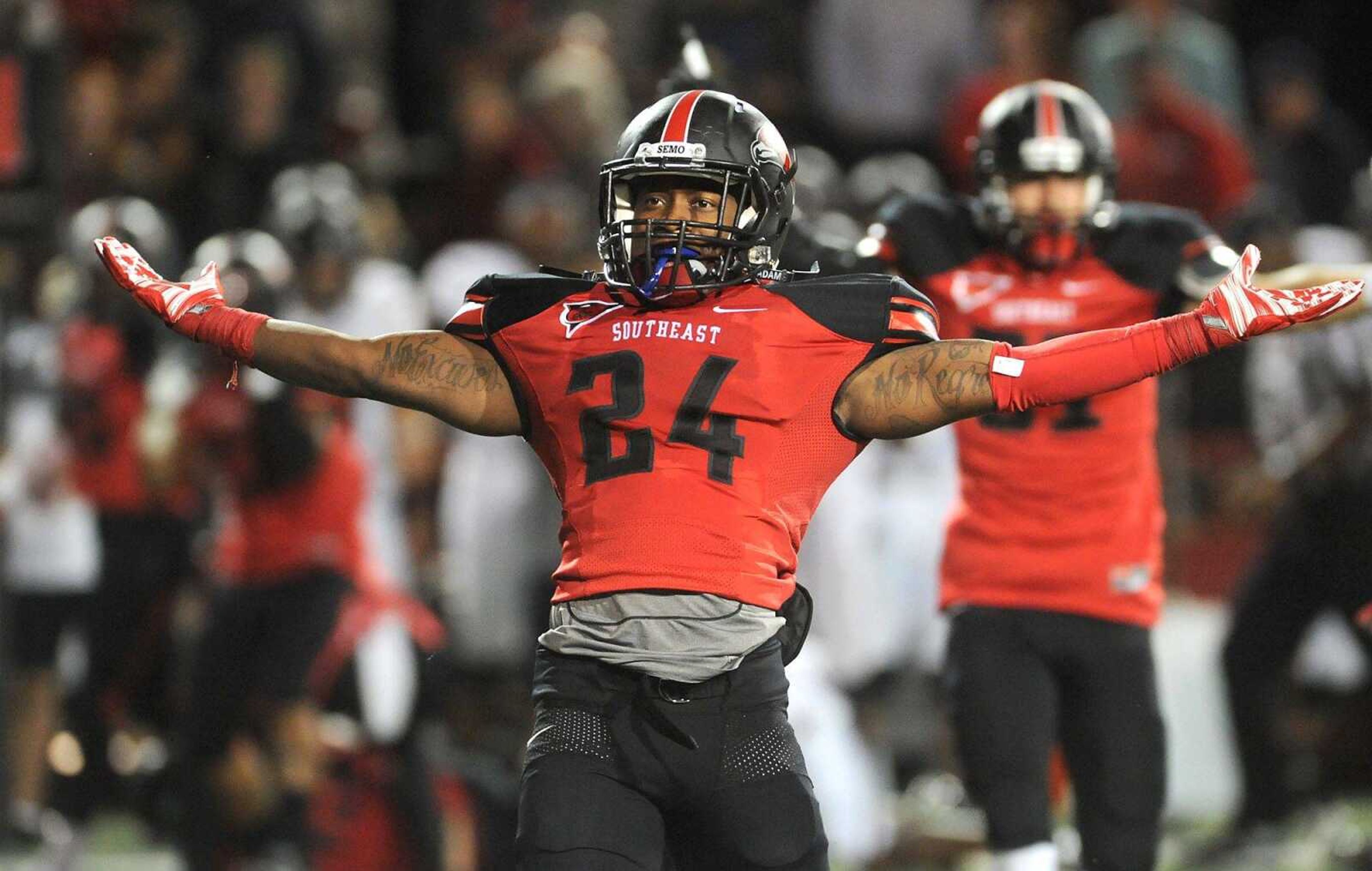 Southeast Missouri State's Ryan Moore celebrates the Redhawks  27-24 victory over Southern Illinois as time expires in the fourth quarter Saturday, Sept. 12, 2015 at Houck Stadium. (Fred Lynch)