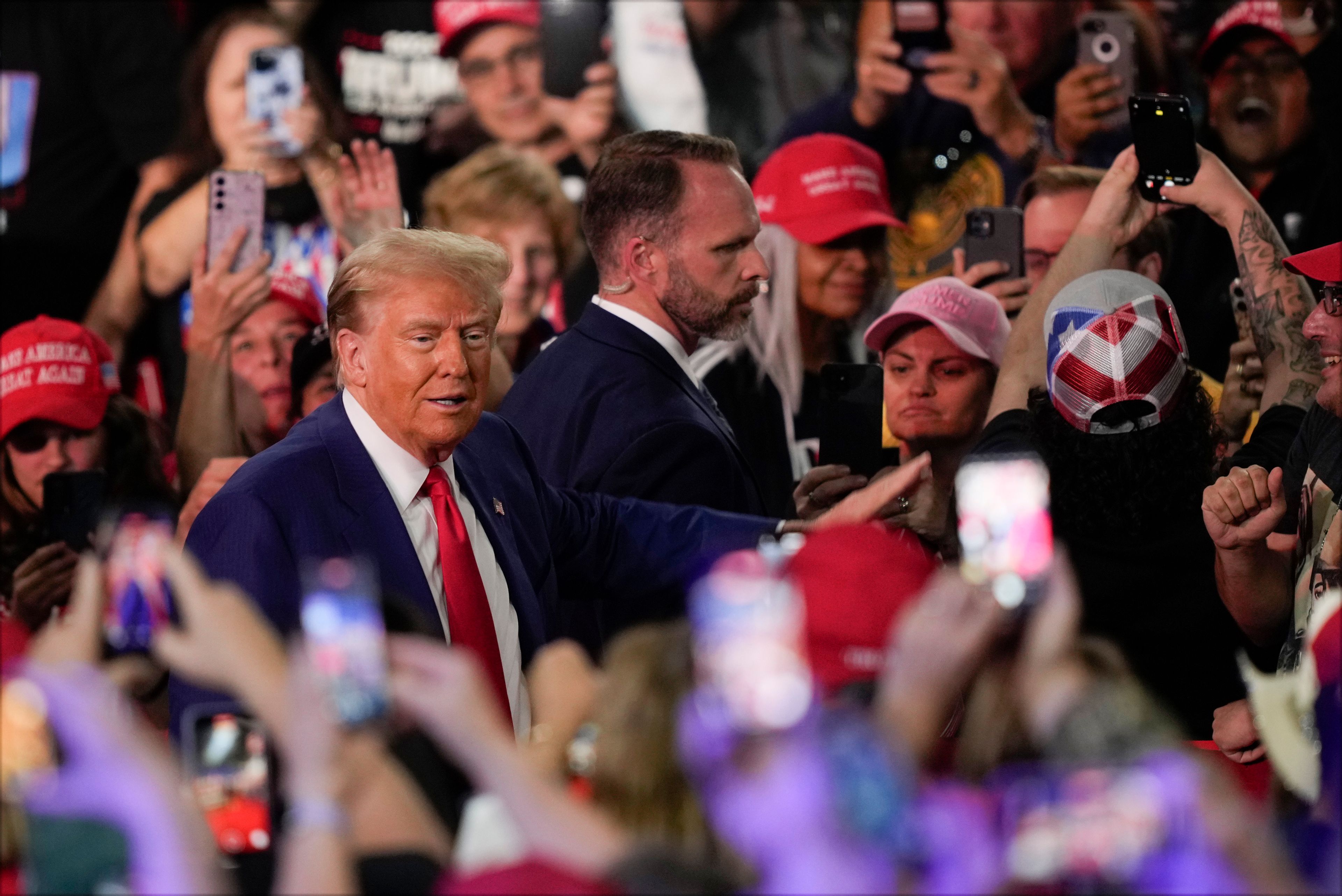 Republican presidential nominee former President Donald Trump arrives at a campaign town hall at the Greater Philadelphia Expo Center & Fairgrounds, Monday, Oct. 14, 2024, in Oaks, Pa. (AP Photo/Matt Rourke)