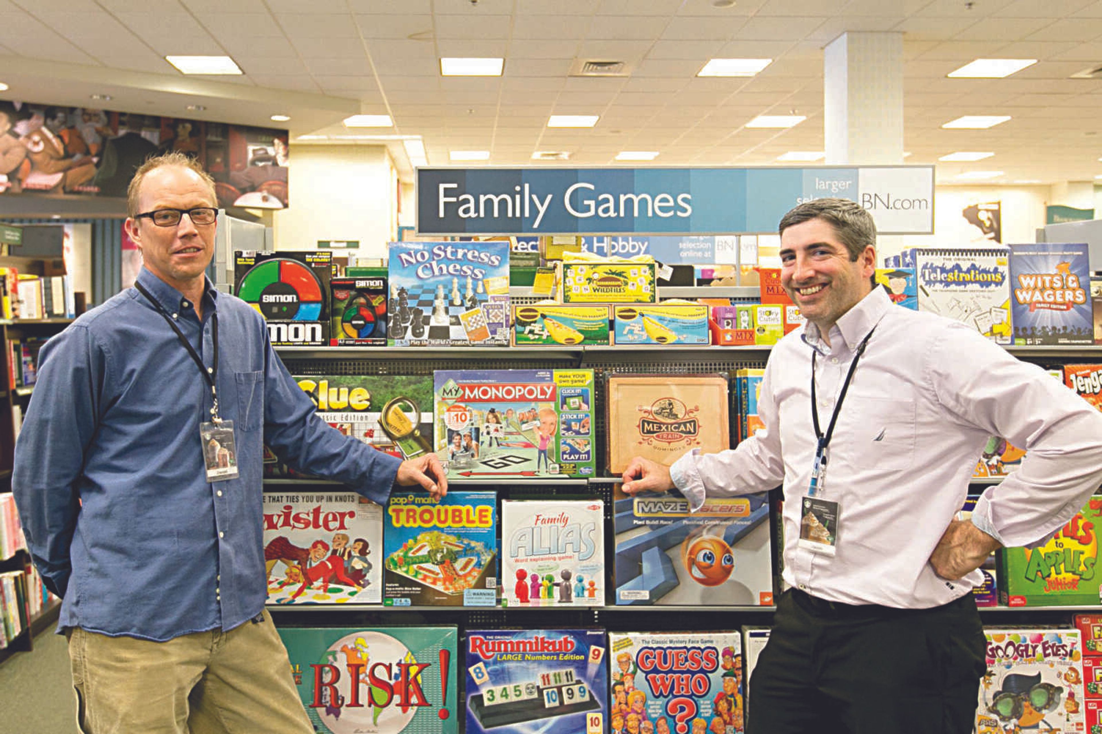 Daniel Seiler, community business development manager, and Jamie Goffey, store manager at Barnes & Noble in Cape Girardeau, pose for a photo in the family games section. (Glenn Landberg)