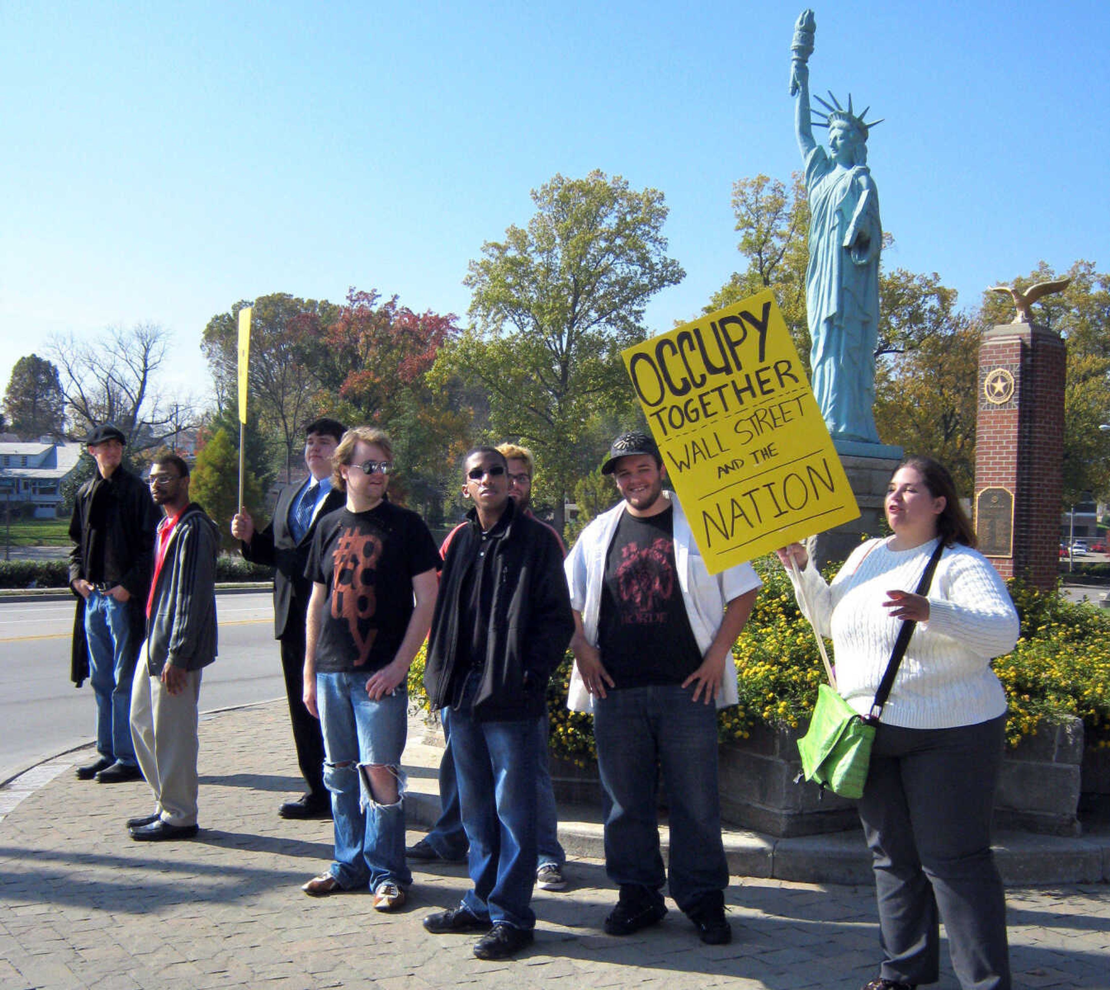 Anti-Wall Street protesters face Broadway traffic Saturday, Nov. 5, 2011 at Capaha Park in Cape Girardeau. The group earlier marched past the federal courthouse and city hall. (Erin Ragan)