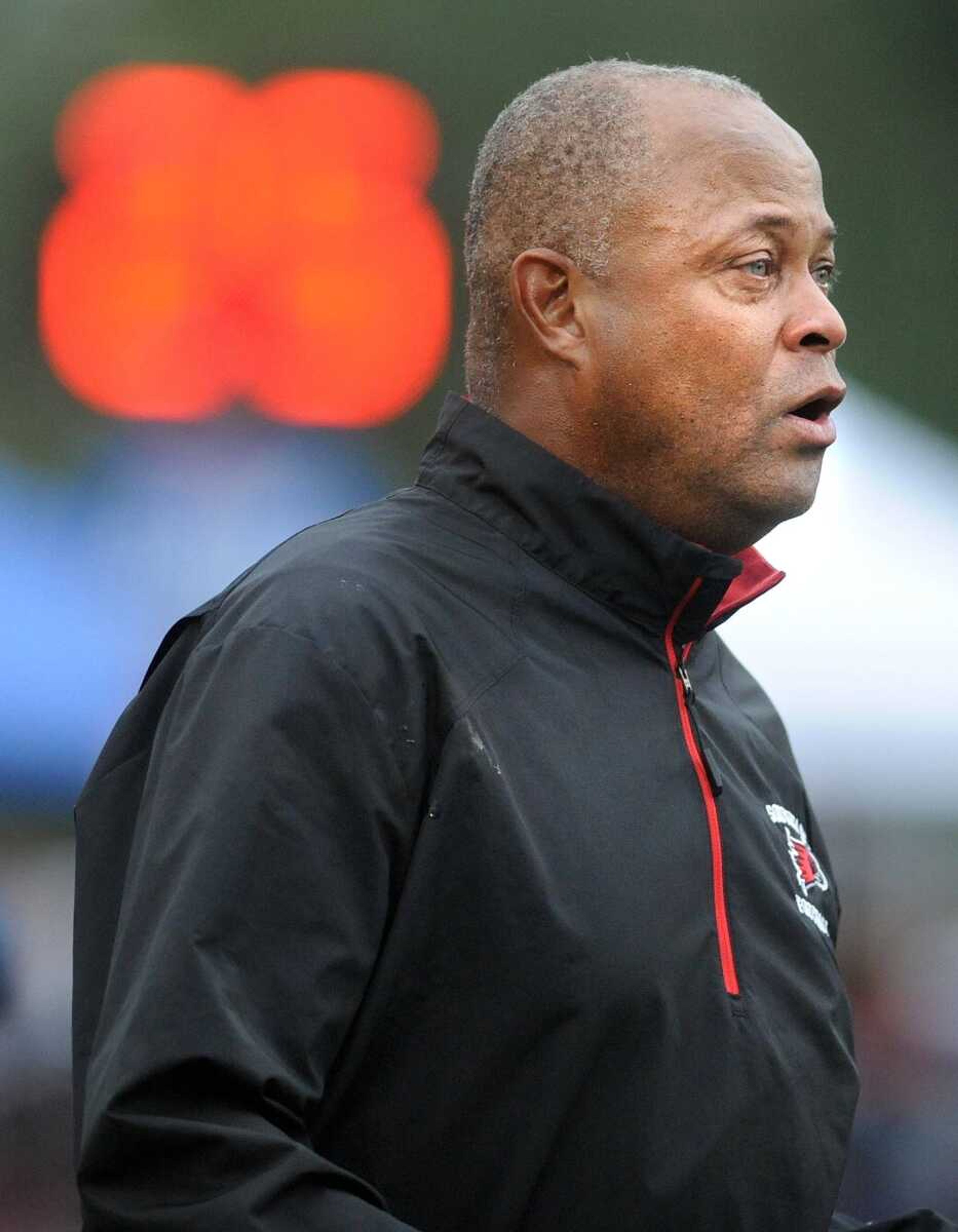 Southeast Missouri State head coach Tony Samuel reacts to the Redhawks victory over Murray State, Saturday, Oct. 12, 2013, at Houck Stadium. Southeast won 37-34 in overtime. (Laura Simon)