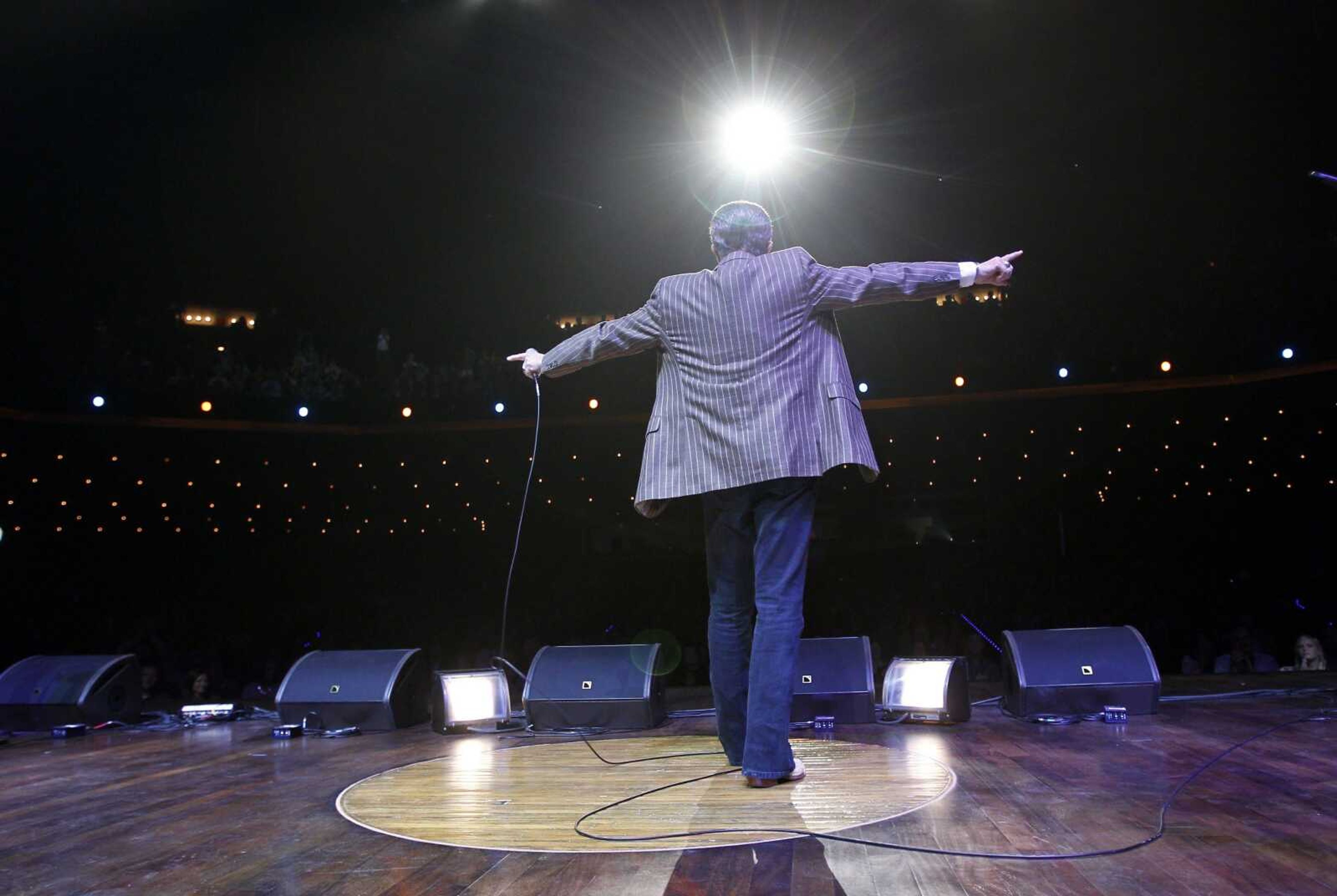 In this Sept. 28, 2010 file photo, Grand Ole Opry veteran Bill Anderson performed on the circle of wood at the center of the stage in the Grand Ole Opry House in Nashville, Tenn. The show was the first to be held in the Opry House since the facility was heavily damaged by floodwaters in May 2010. The circle of wood was taken from the Ryman Auditorium, a former home of the Opry, when the show moved to the present Grand Ole Opry House in 1974. (AP Photo/Mark Humphrey, file)