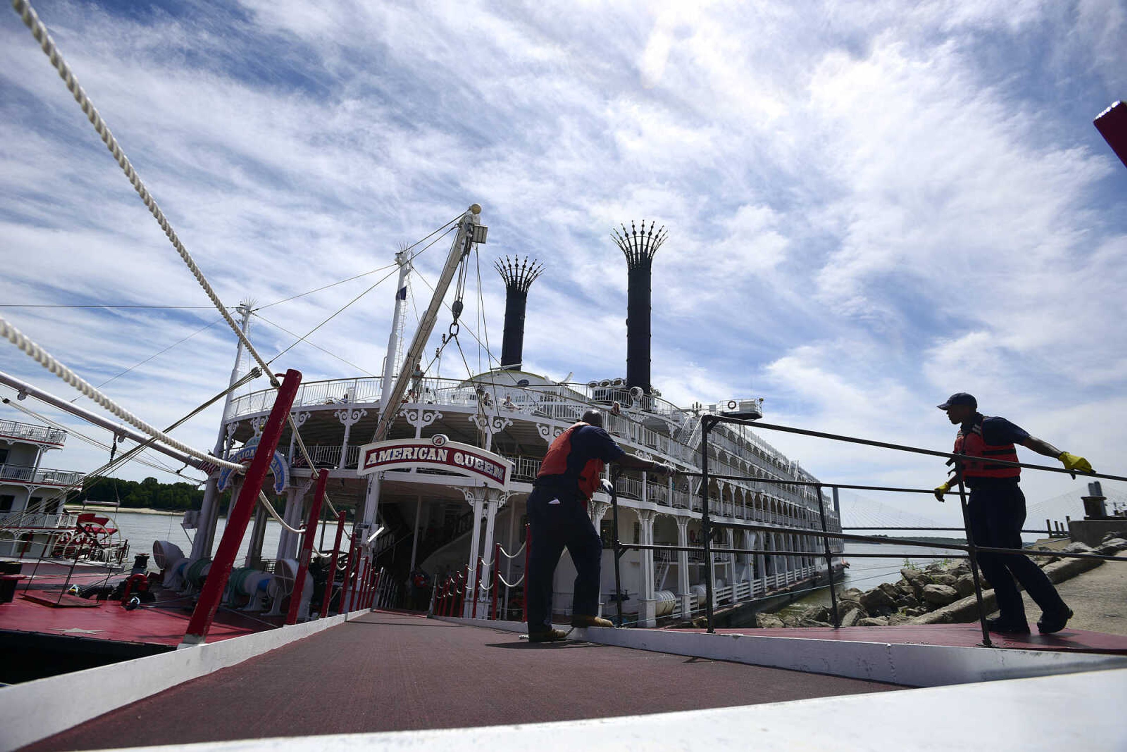 Crew members prepare the American Queen for departure from Riverfront Park on Wednesday, Aug. 23, 2017, in downtown Cape Girardeau.