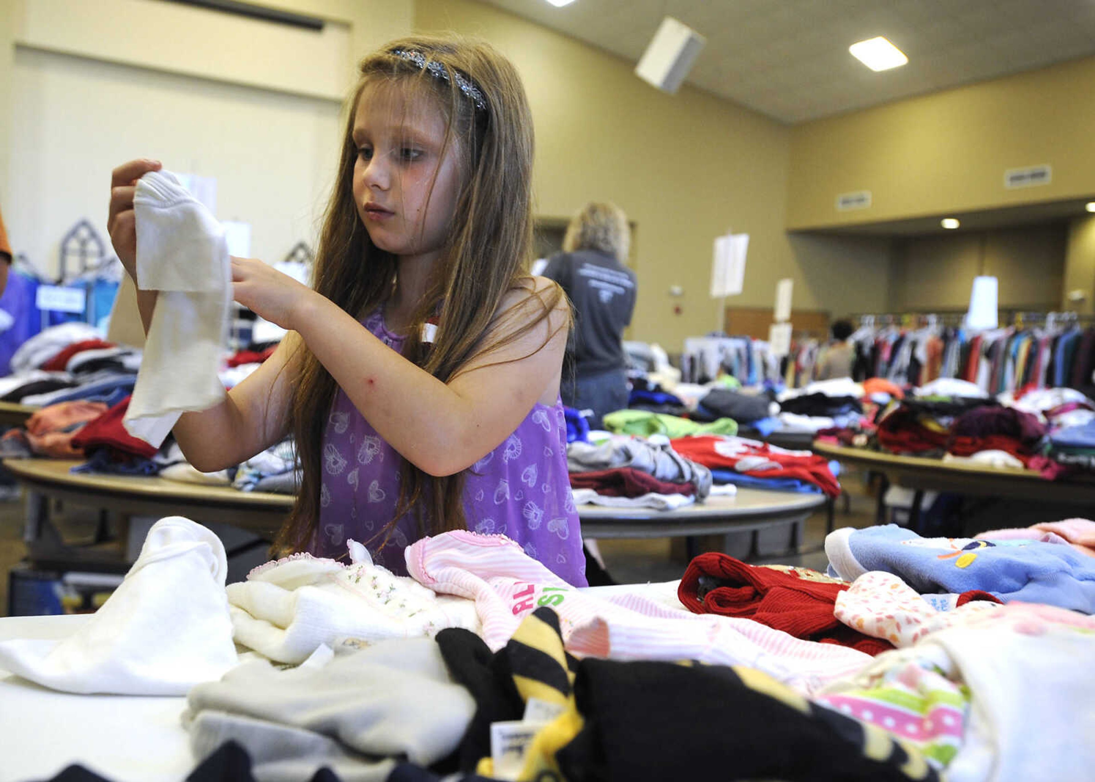 Kailey Pierce shops at New McKendree South Campus during the 100-Mile Yard Sale along Highway 25, Saturday, May 28, 2016 in Jackson.