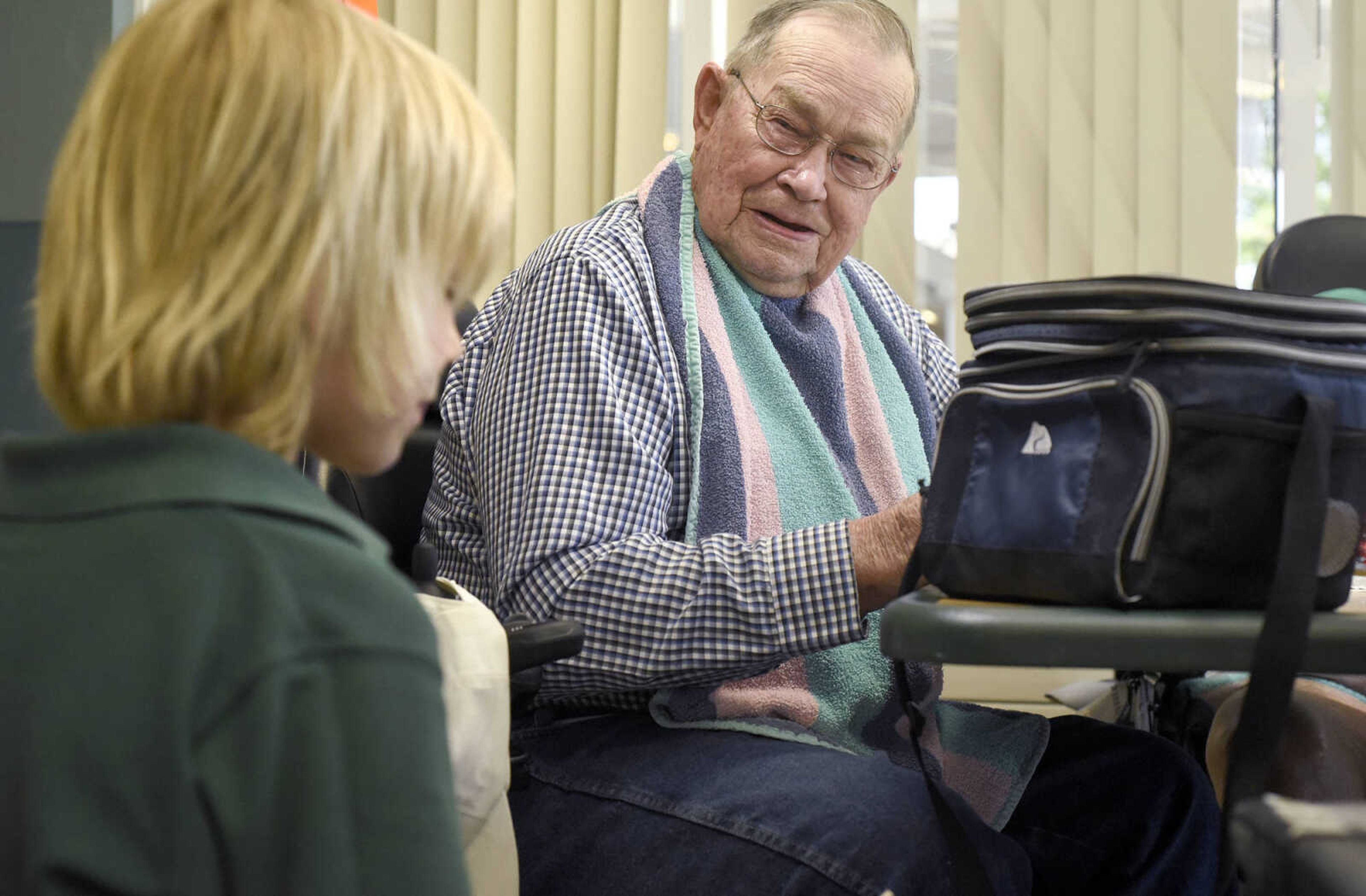 Leonard Koenig chats with Prodigy Leadership Academy student, Joey Charlton, over lunch on Tuesday, April 25, 2017, at the Missouri Veterans Home in Cape Girardeau.