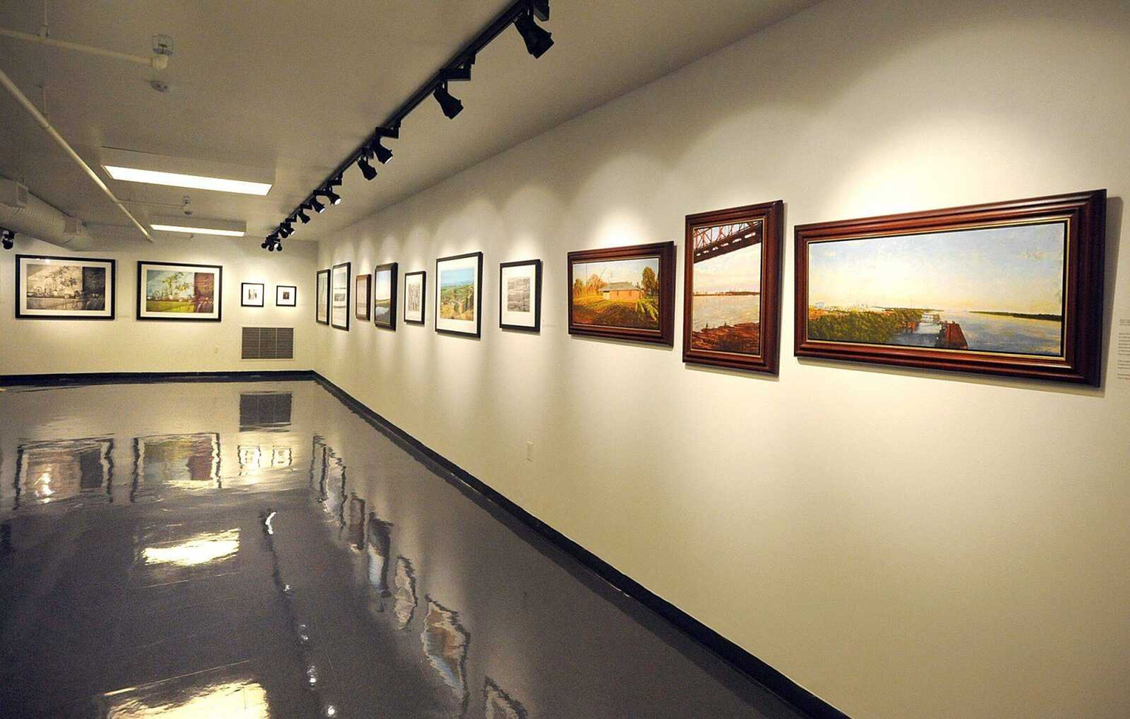 A collection of lithographs, oil paintings and graphite drawings by James D. Butler is on display at the River Campus Art Gallery of Southeast Missouri State University.LAURA SIMONlsimon@semissourian.com