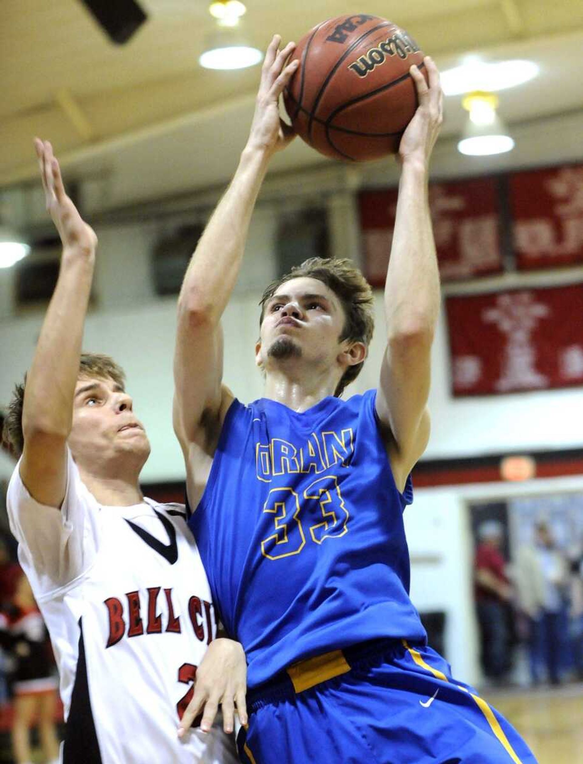 Oran's Layne Johnson takes a shot against Bell City's Taylor Jackson during the fourth quarter Friday, Feb. 5, 2016 in Bell City, Missouri.