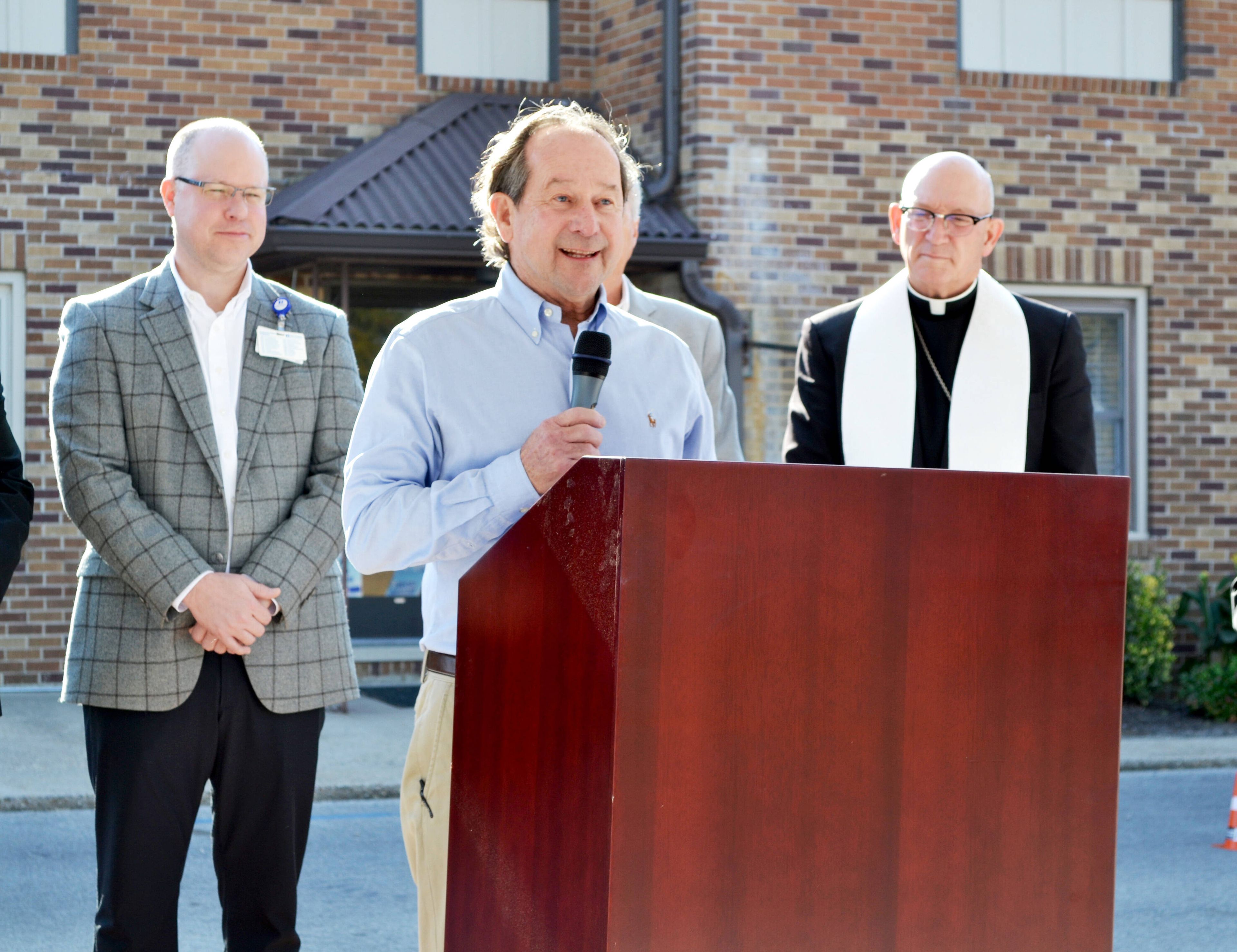 East Prairie Mayor Kevin Mainord, center, speaks to the crowd during the groundbreaking ceremony of Saint Francis Healthcare System’s new rural health clinic Tuesday, Oct. 29, in East Prairie. Looking on are Justin Davison, CEO of Saint Francis Healthcare System, left, and the Most Rev. Bishop Edward M. Rice.