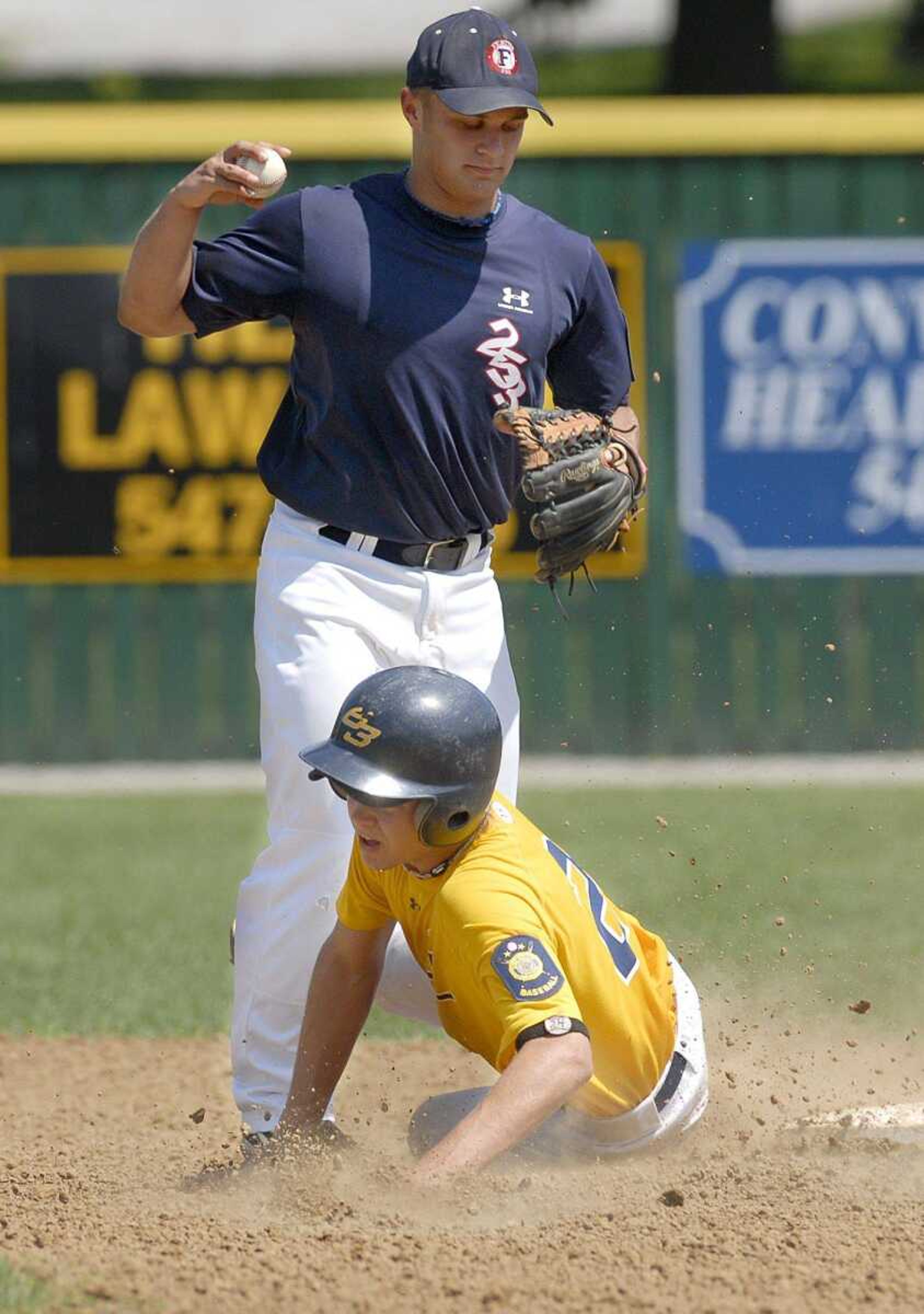 Festus Legion's J.T. Lovelace tags out Cape Legion's Tyler Glidewell during the third inning of their Zone 4 tournament game Friday in Perryville. (Elizabeth Dodd)