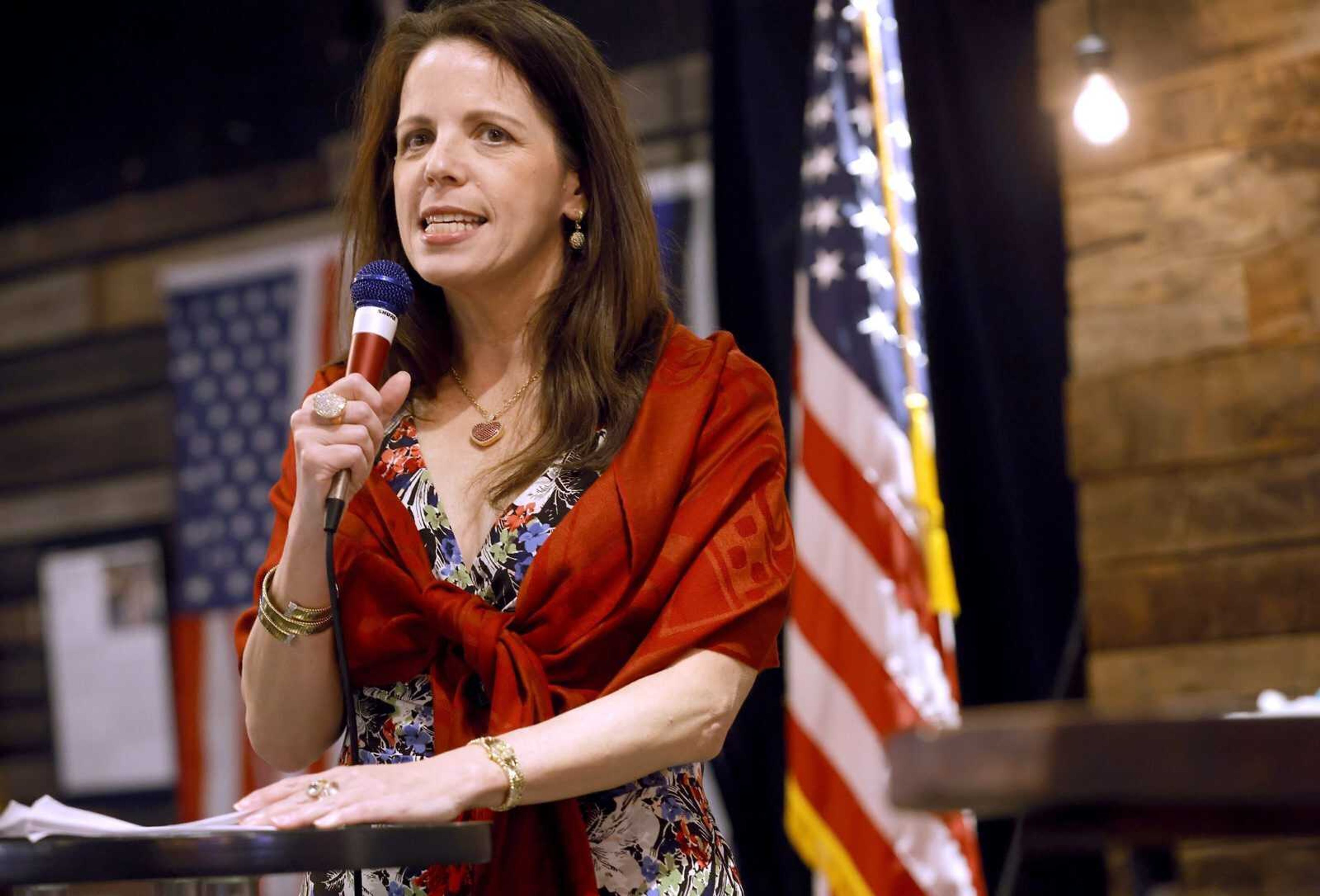 Dr. Simone Gold speaks to a large crowd inside The Elephant in the Room in Jenks during a Frontline Doctor's Uncensored Truth Tour event June 30, 2021. Gold, an anti-vaccine medical doctor who pleaded guilty to illegally entering the Capitol, founded a nonprofit that raised more than $430,000 for her legal expenses. The fundraising appeal by Gold's group, America's Frontline Doctors, didn't mention her guilty plea, prosecutors noted.