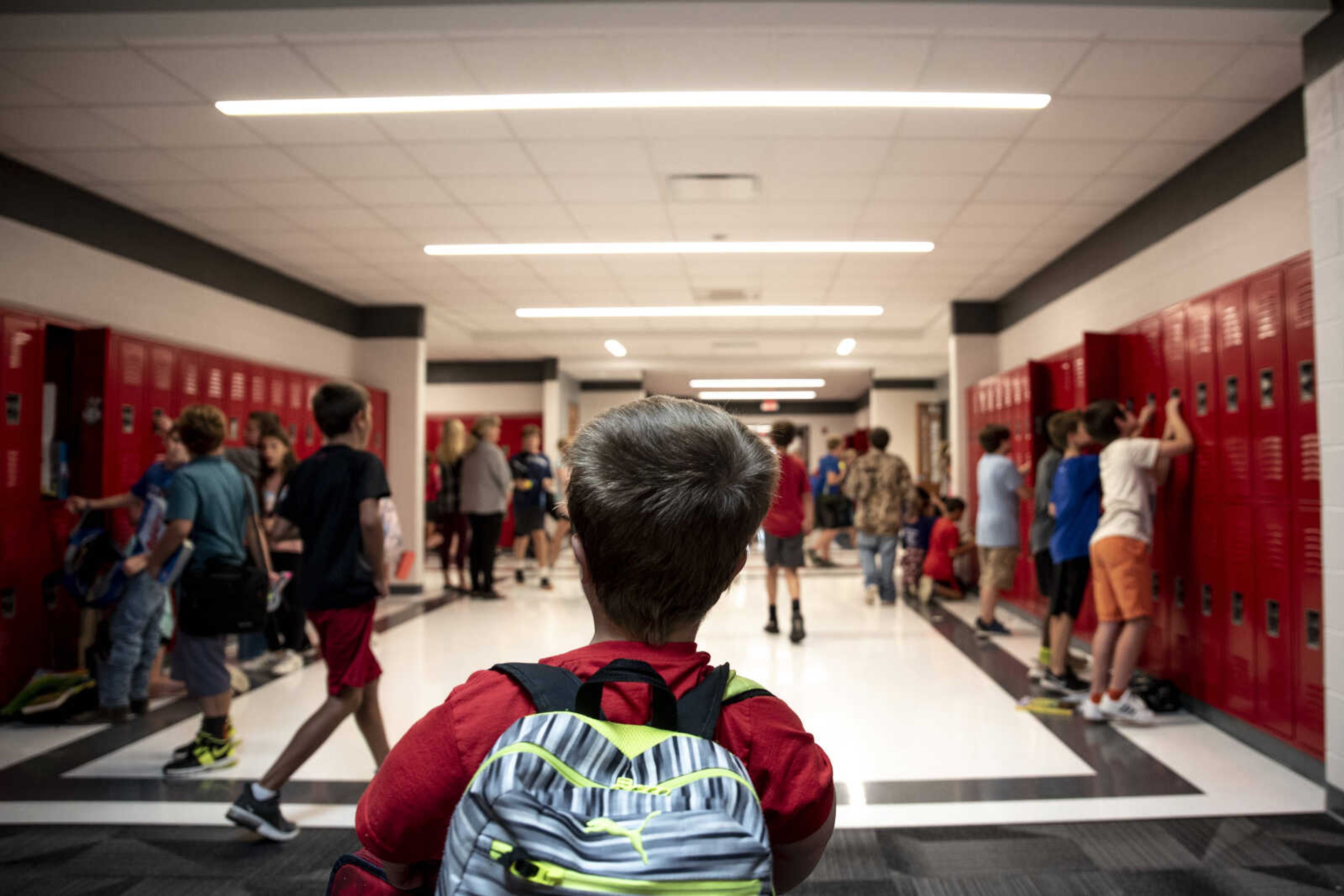 Izaac Pursley navigates his way through the halls of Jackson Middle School to get to his next class Oct. 4, 2018, in Jackson.