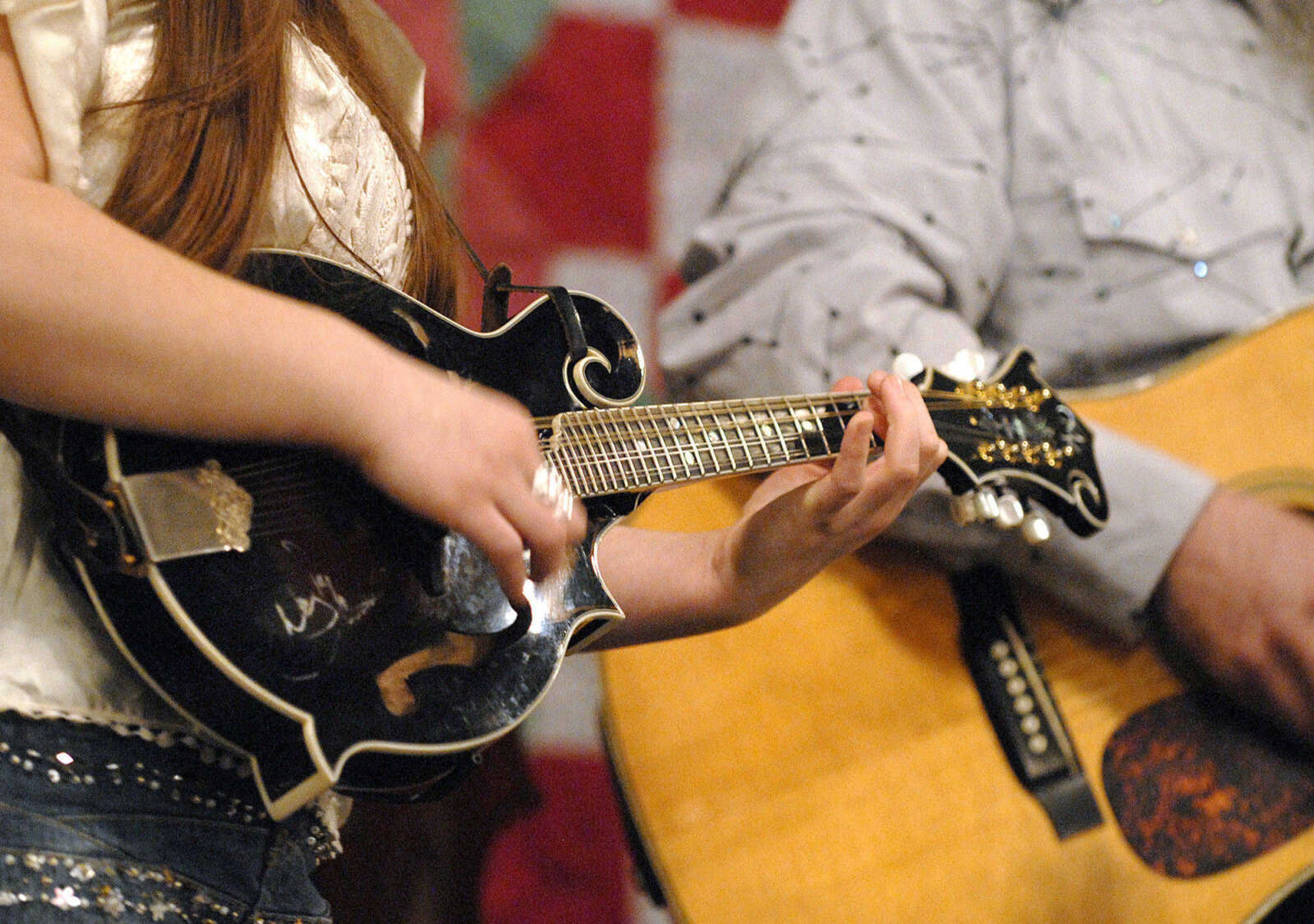 LAURA SIMON ~ lsimon@semissourian.com
New Blood performs Thursday night, January 26, 2012 during the Bootheel Bluegrass Festival at the Bavarian Halle in Fruitland.