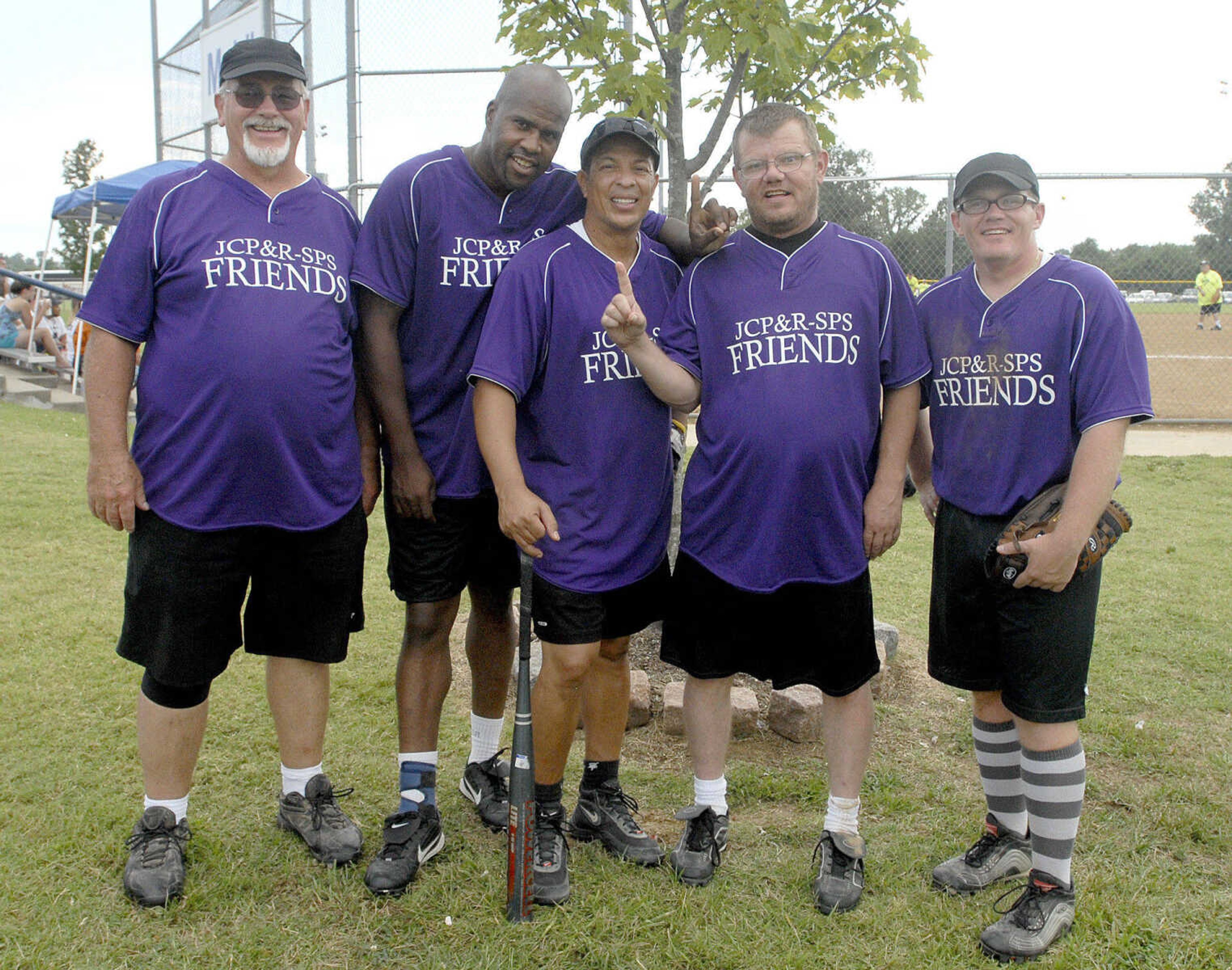 LAURA SIMON ~ lsimon@semissourian.com
The Jackson County Parks and Rec mens division 1 unified mastered team out of Kansas City, Mo. pose for a photo before their game Saturday, August 13, 2011 during the Special Olympics State Outdoor Championship at Shawnee Sports Complex in Cape Girardeau.