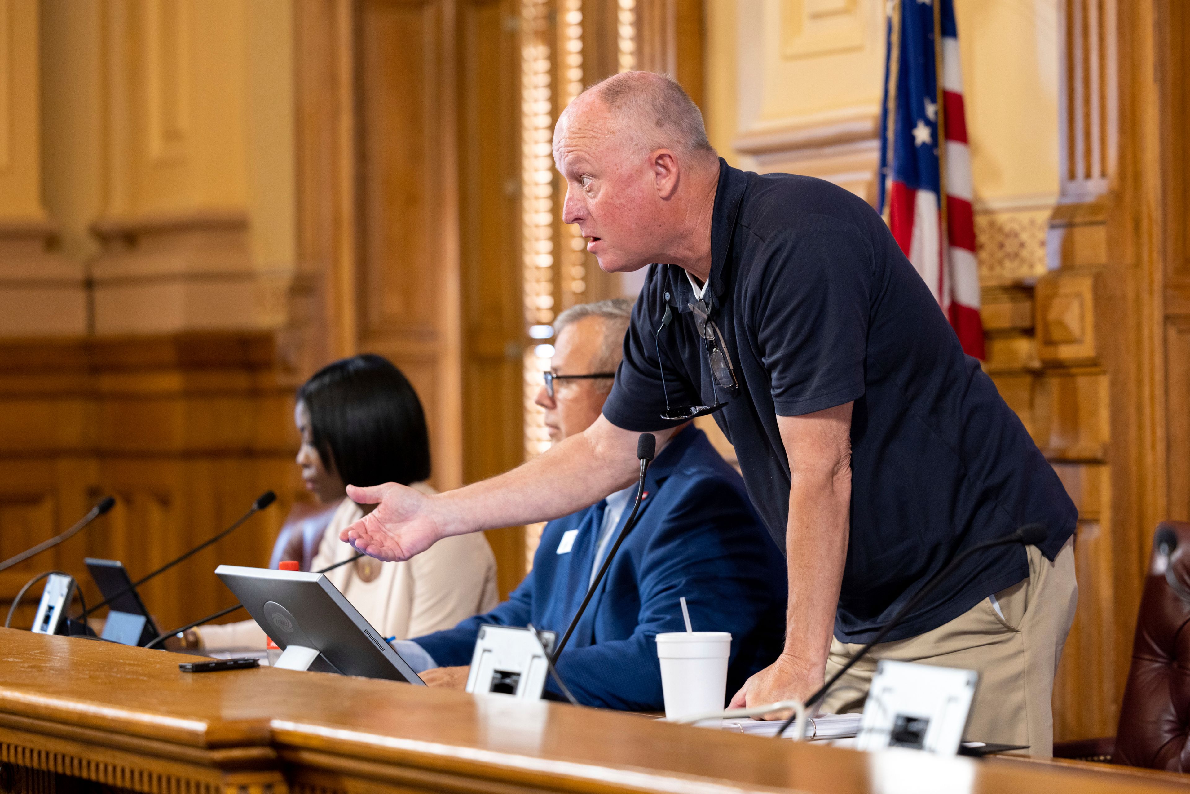 FILE - State Election Board member Rick Jeffares asks the crowd to settle down during a hastily planned State Election Board meeting at the Capitol in Atlanta, July 12, 2024. (Arvin Temkar/Atlanta Journal-Constitution via AP, File)/